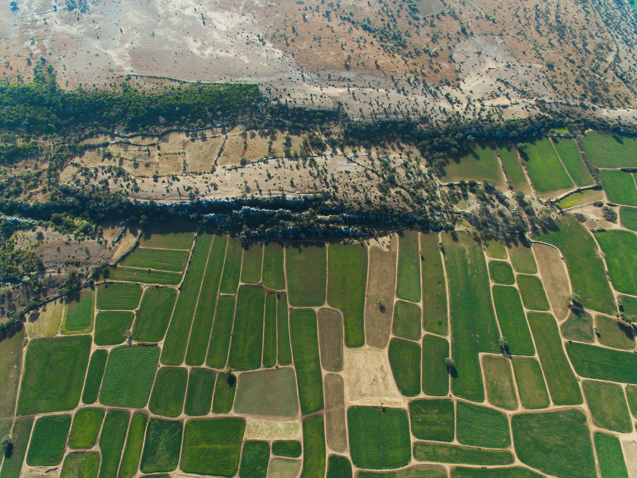 ariel view of farm lands and hills