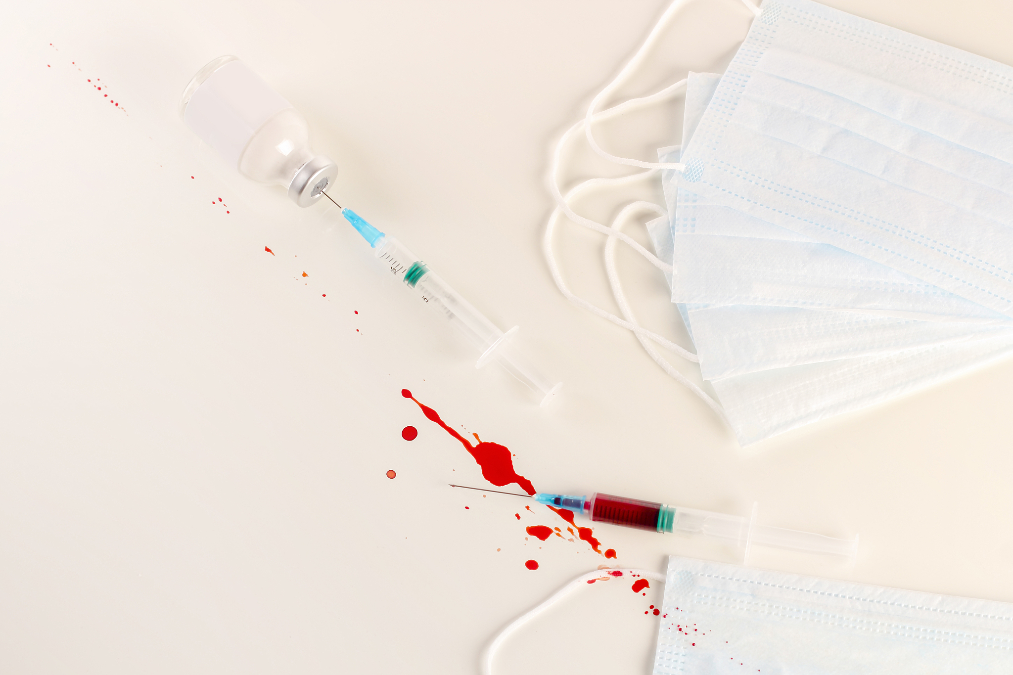surgical or viral mask, syringe and blood sample, vaccine ampoul
