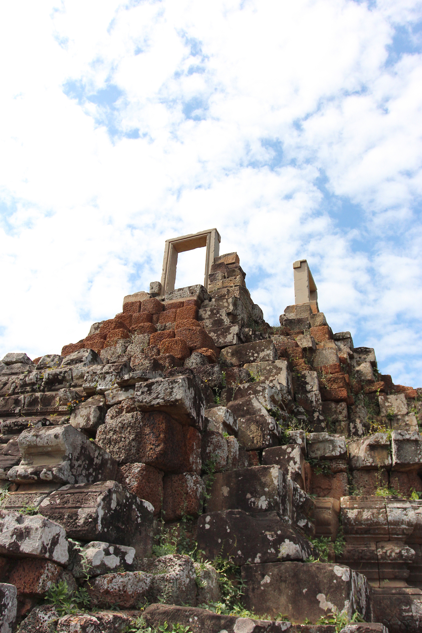 the ruins of a temple in the complex of angkor, near the ancient
