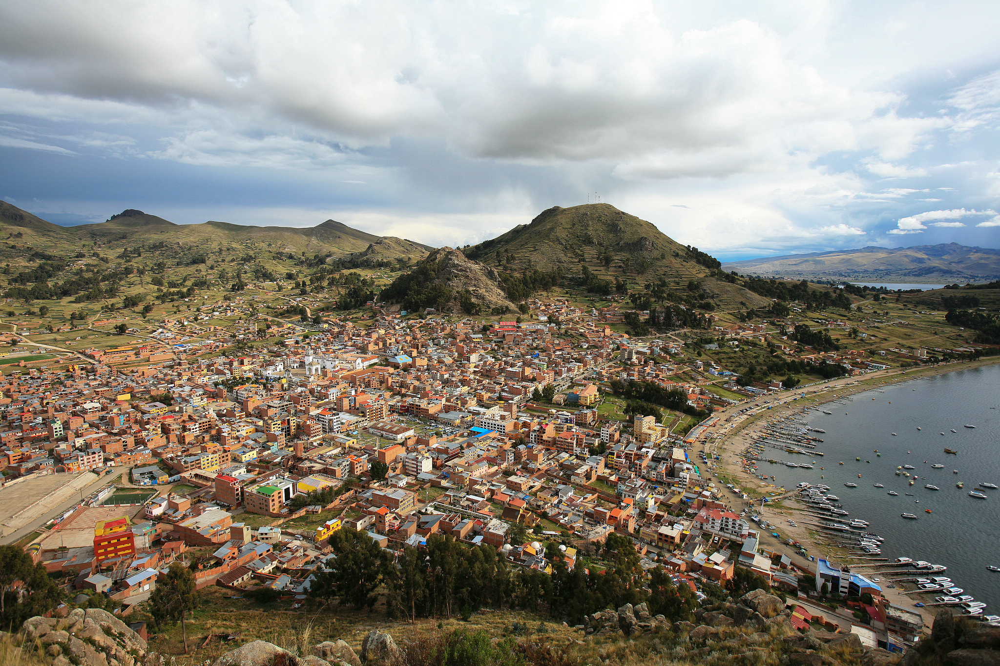 view of copacabana city, on the shore of lake titicaca, and the 
