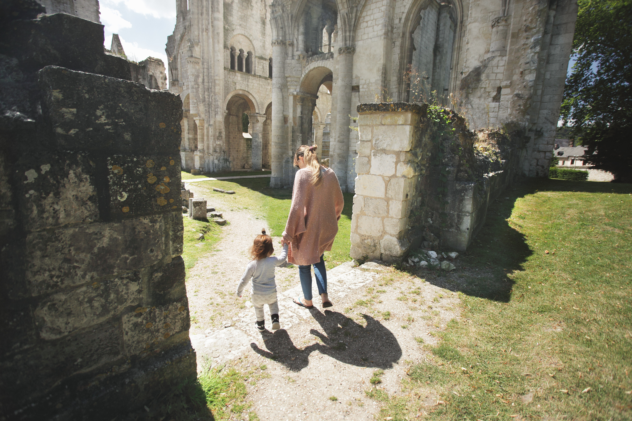 mom with daughter visiting ruins