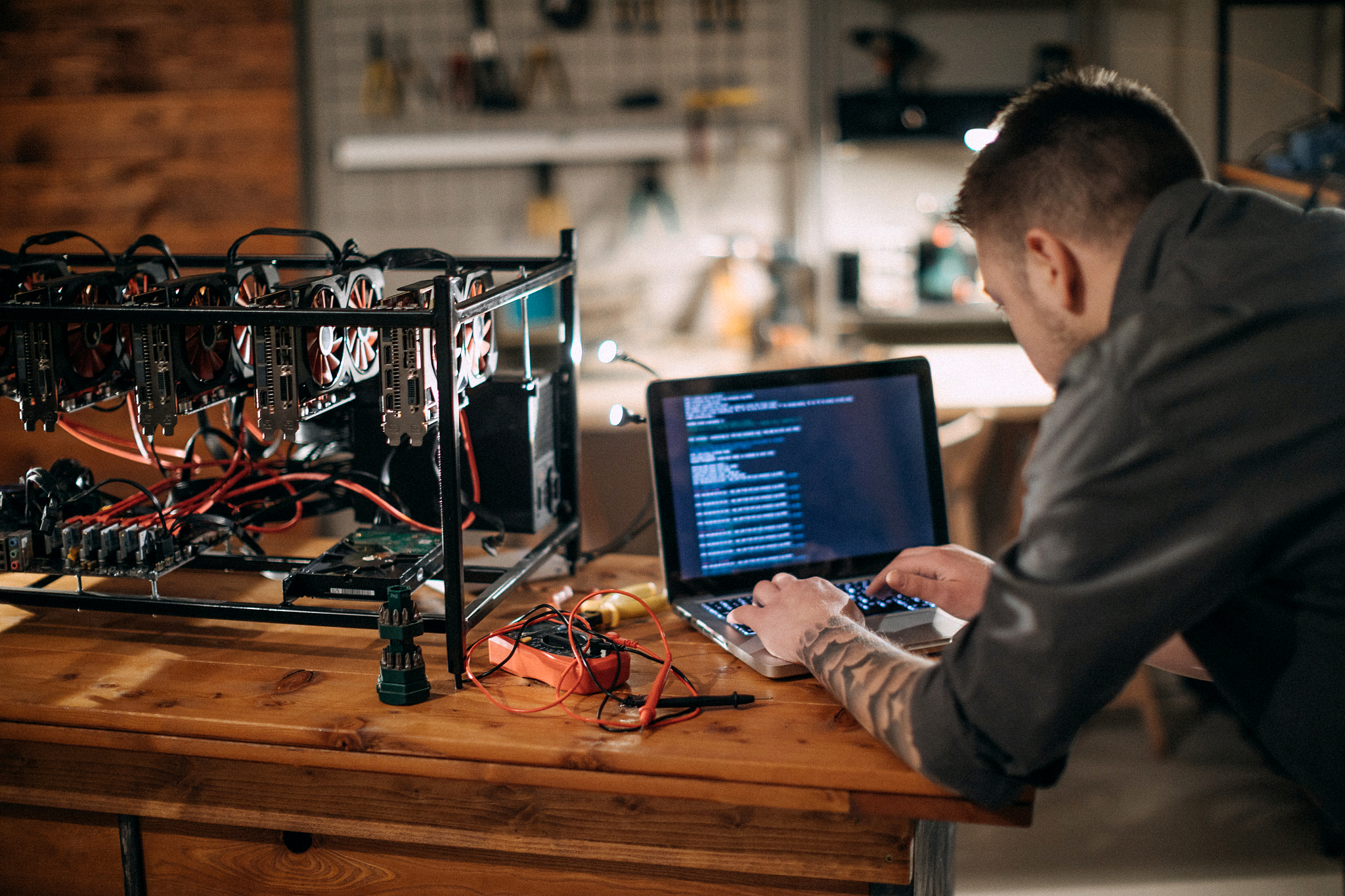 programmer setting up mining rig with gpu