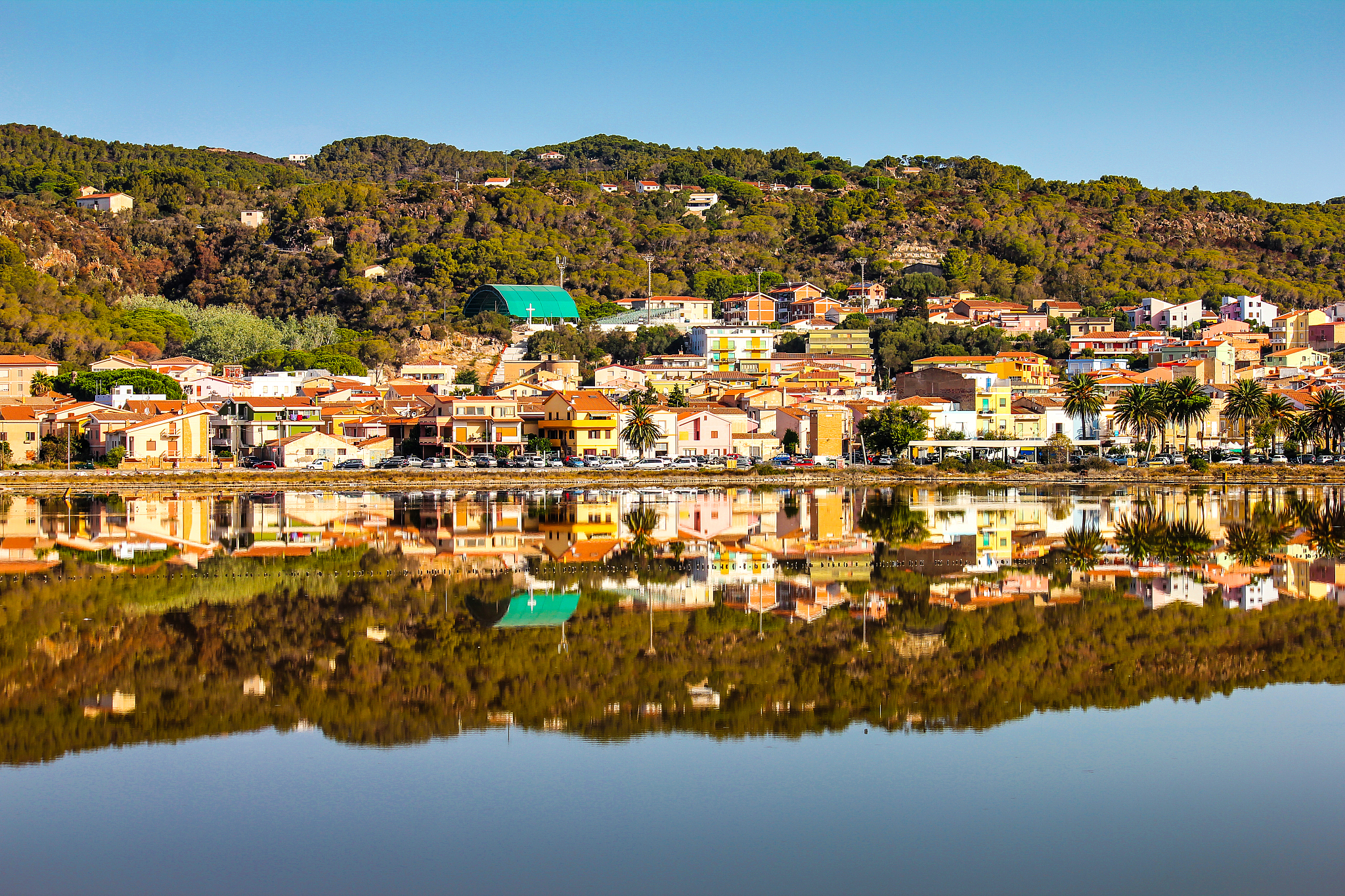 beautiful view of the city of carloforte which is reflected in t