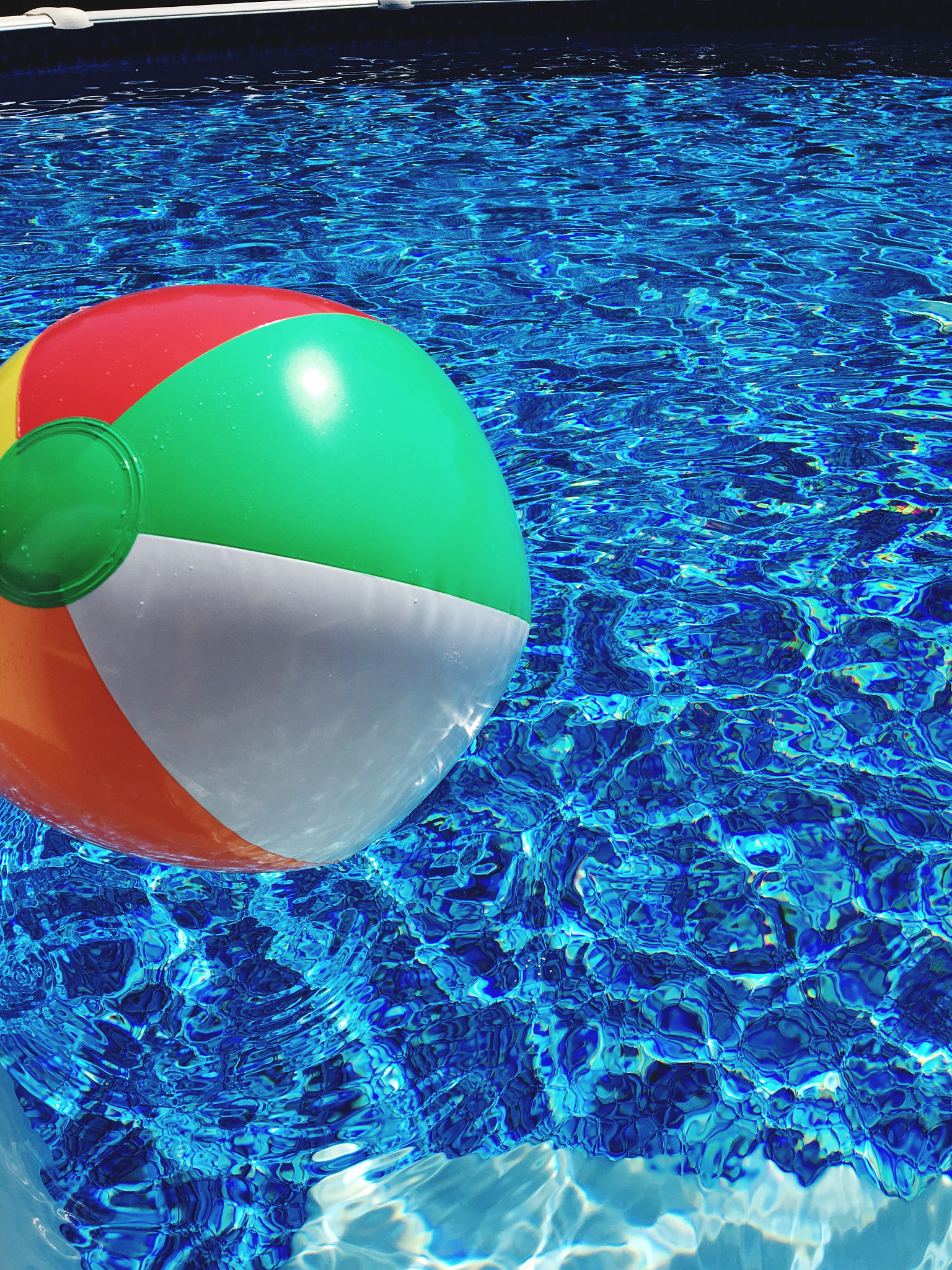 inflatable ball in swimming pool