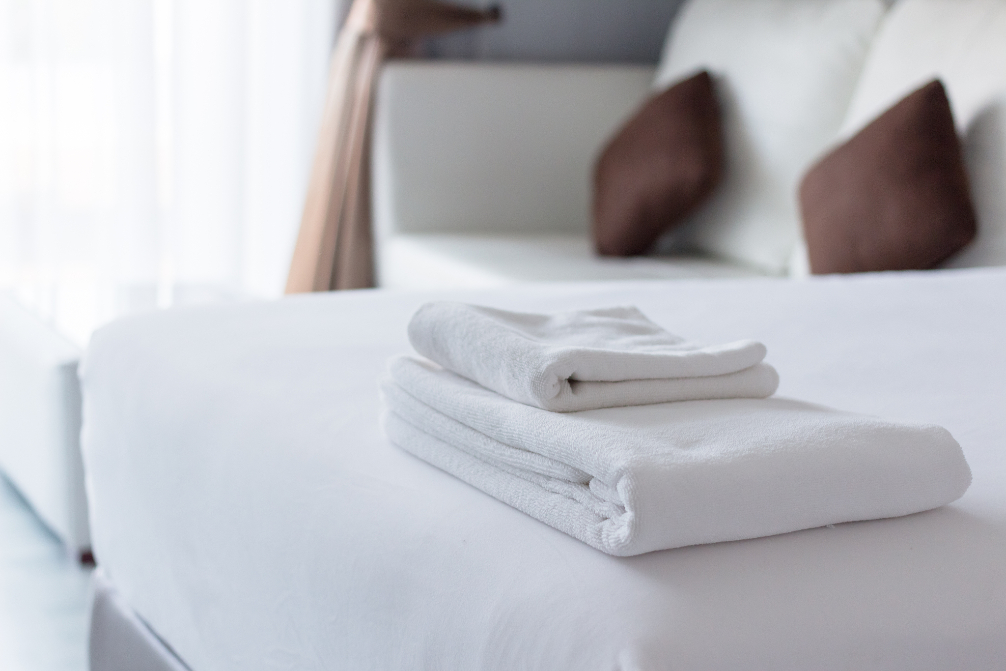 white towel on bed
