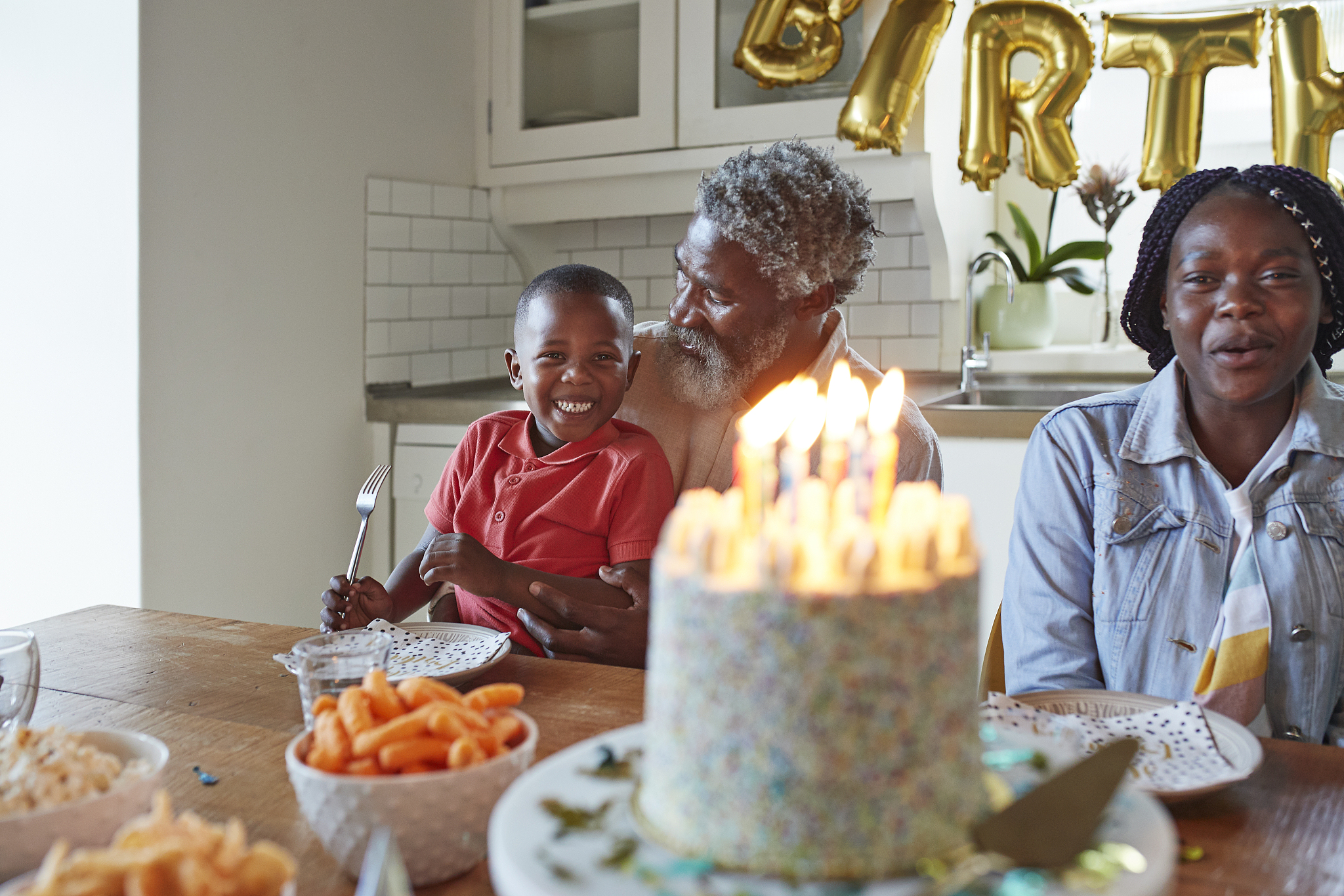 family at home during birthday party