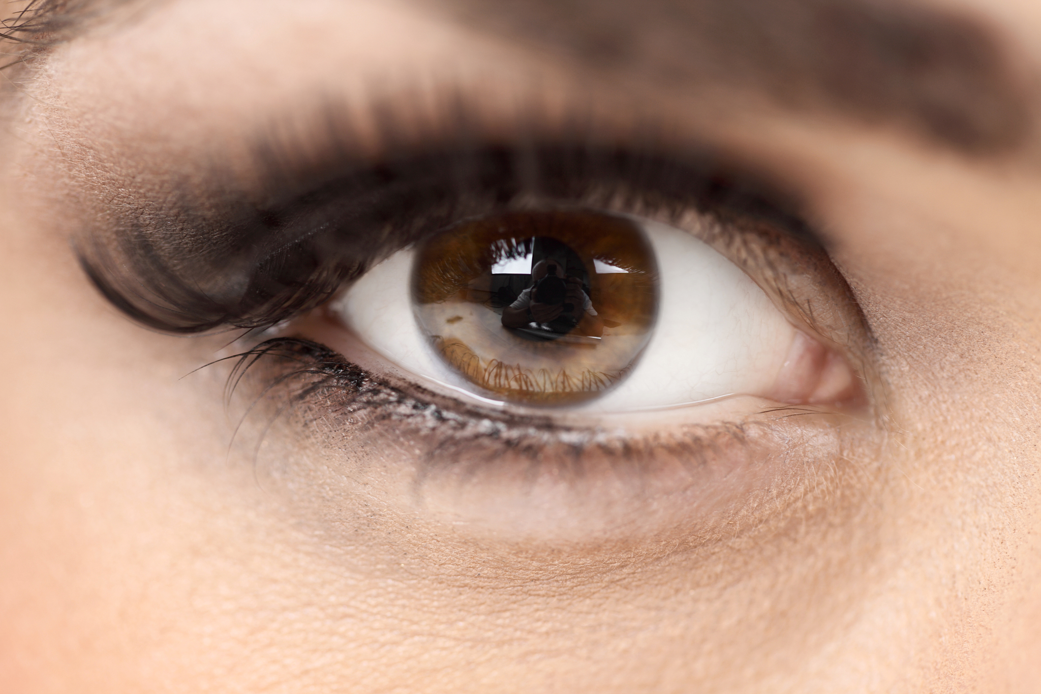 woman's brown eye
