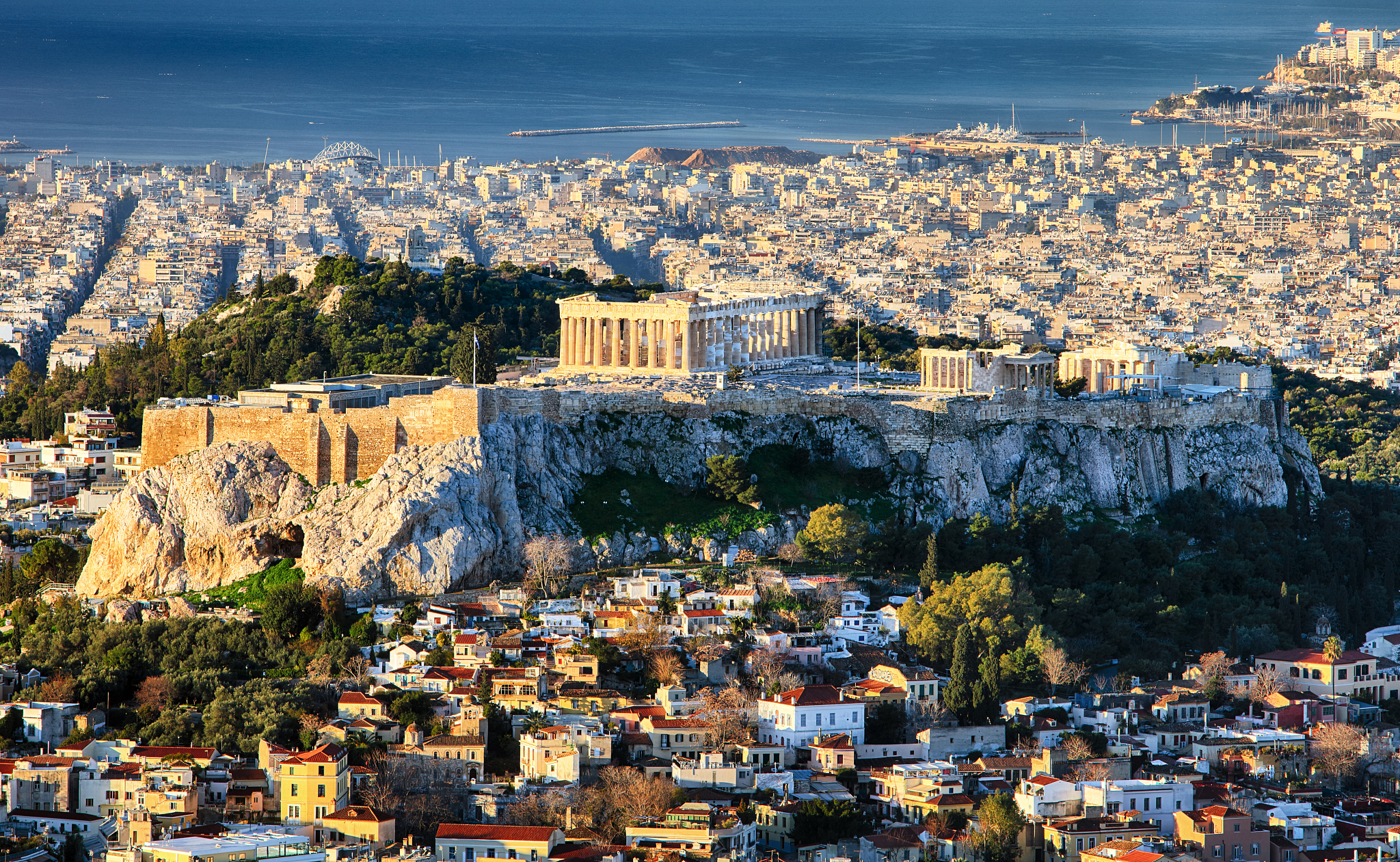 aerial view over athens with te acropolis and harbour from lycab
