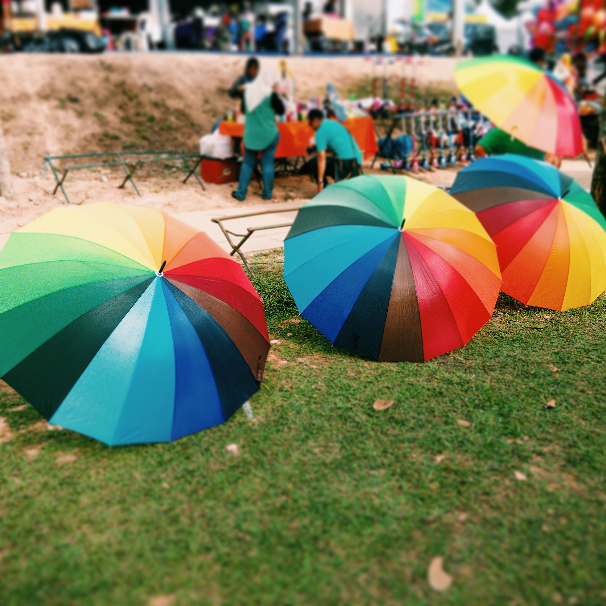 colorful umbrellas on field