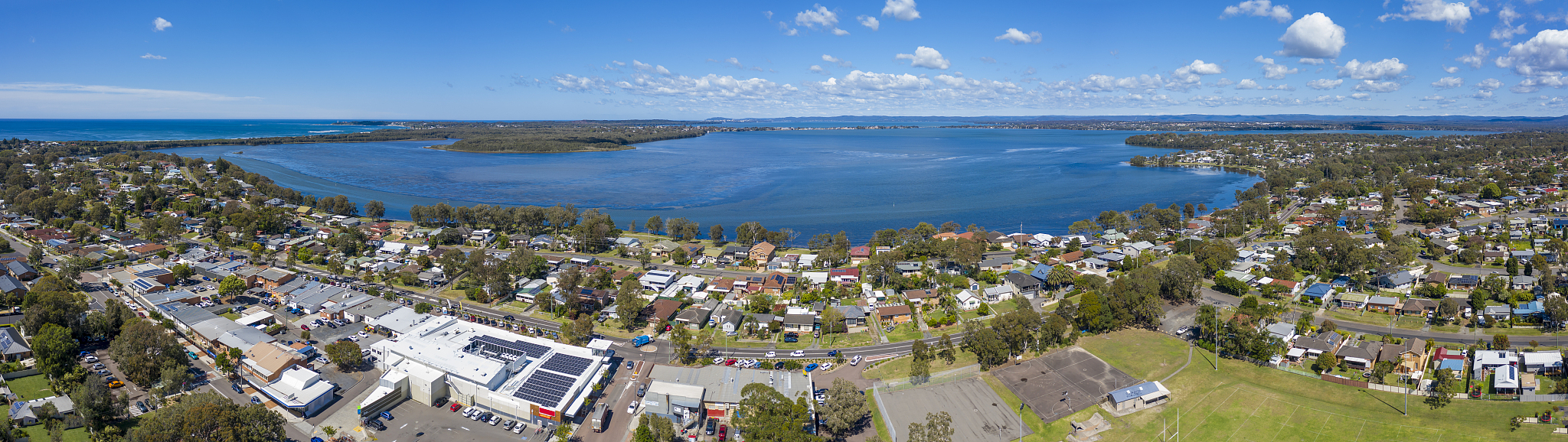 aerial view of lake munmorah and the township of budgewoi on the
