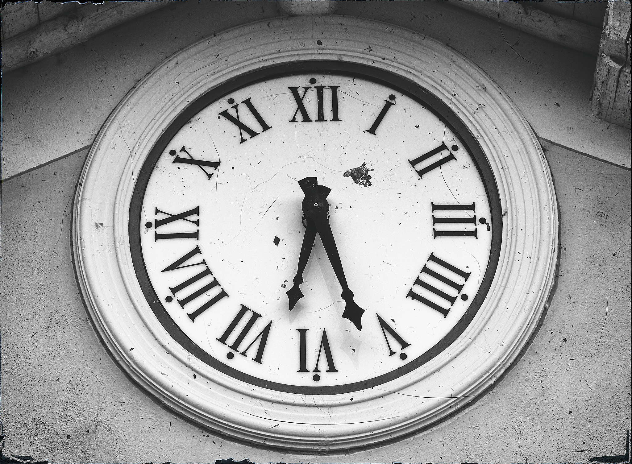 old clock on the wall monochromatic