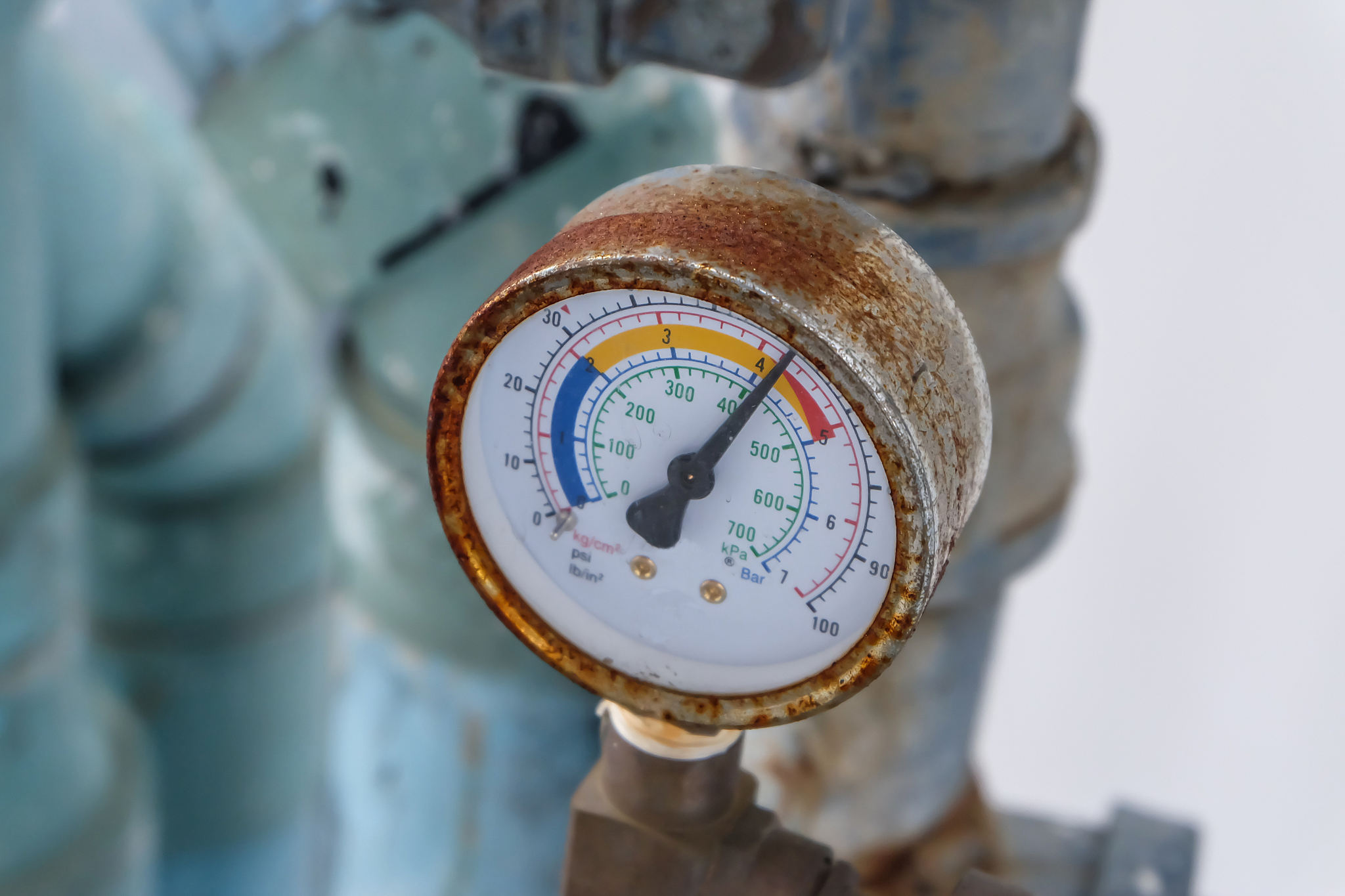 closeup of manometer, measuring gas pressure. pipes and valves a