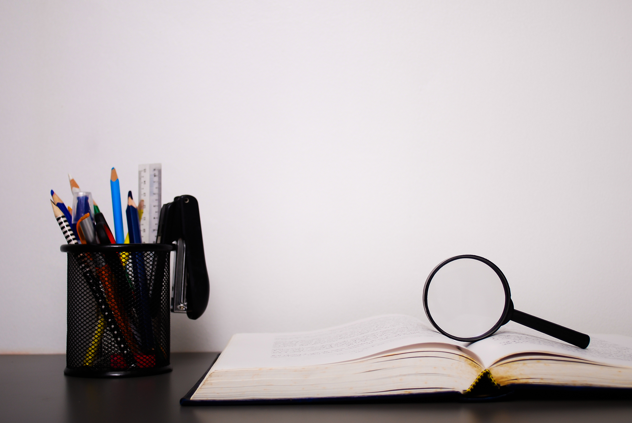 close-up of school supplies on table