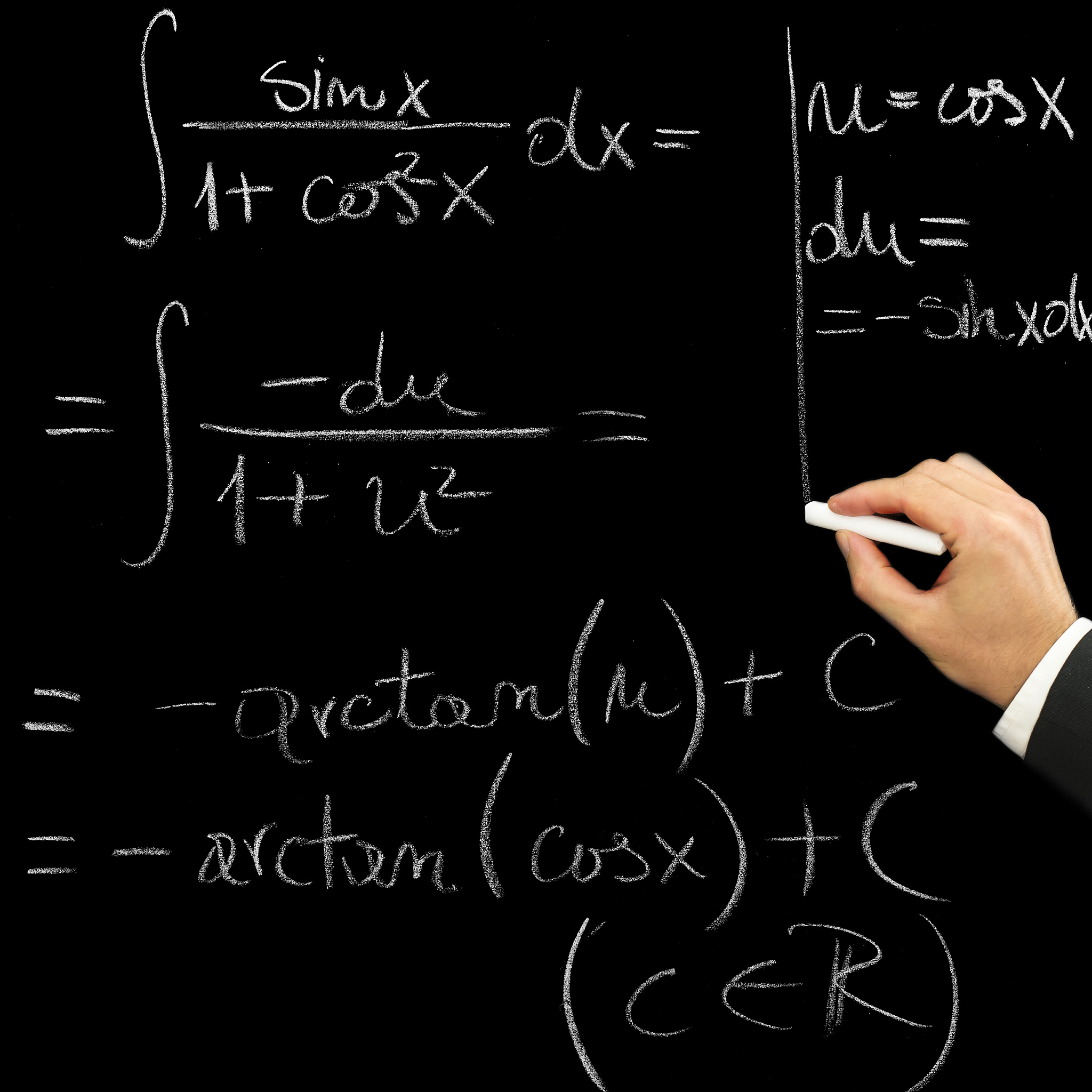 hand writing with chalk a mathematical exercise