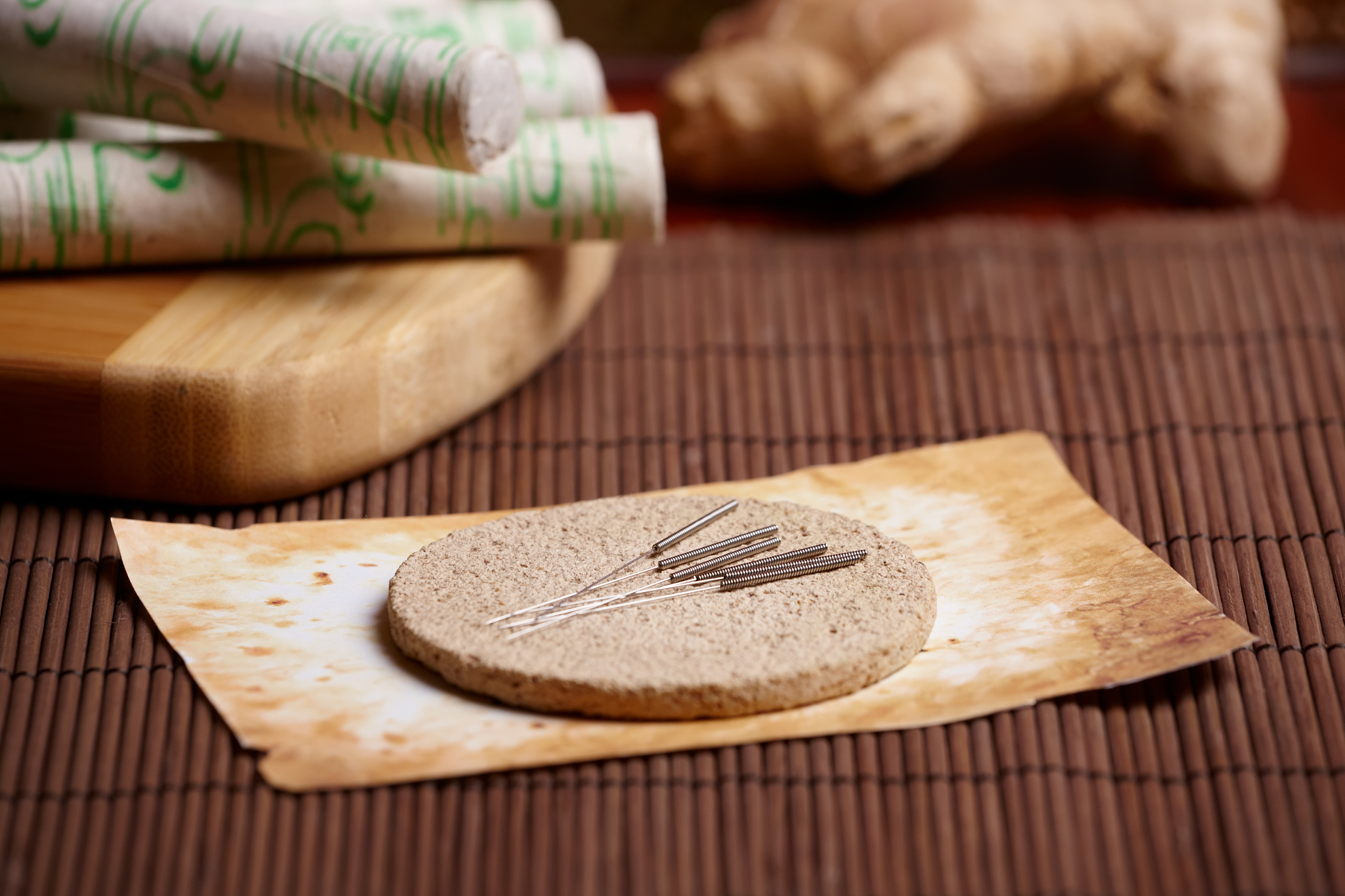 acupuncture needles, moxa sticks and ginger