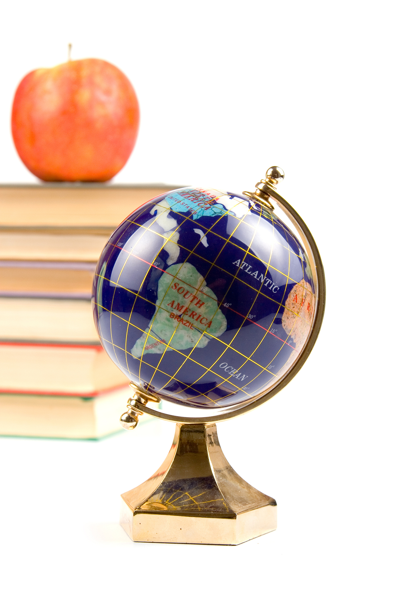 apple, globe and books