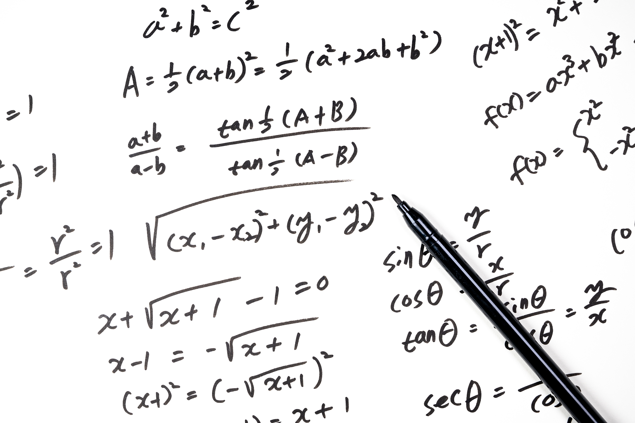 a note full of mathematical formulas. education concept
