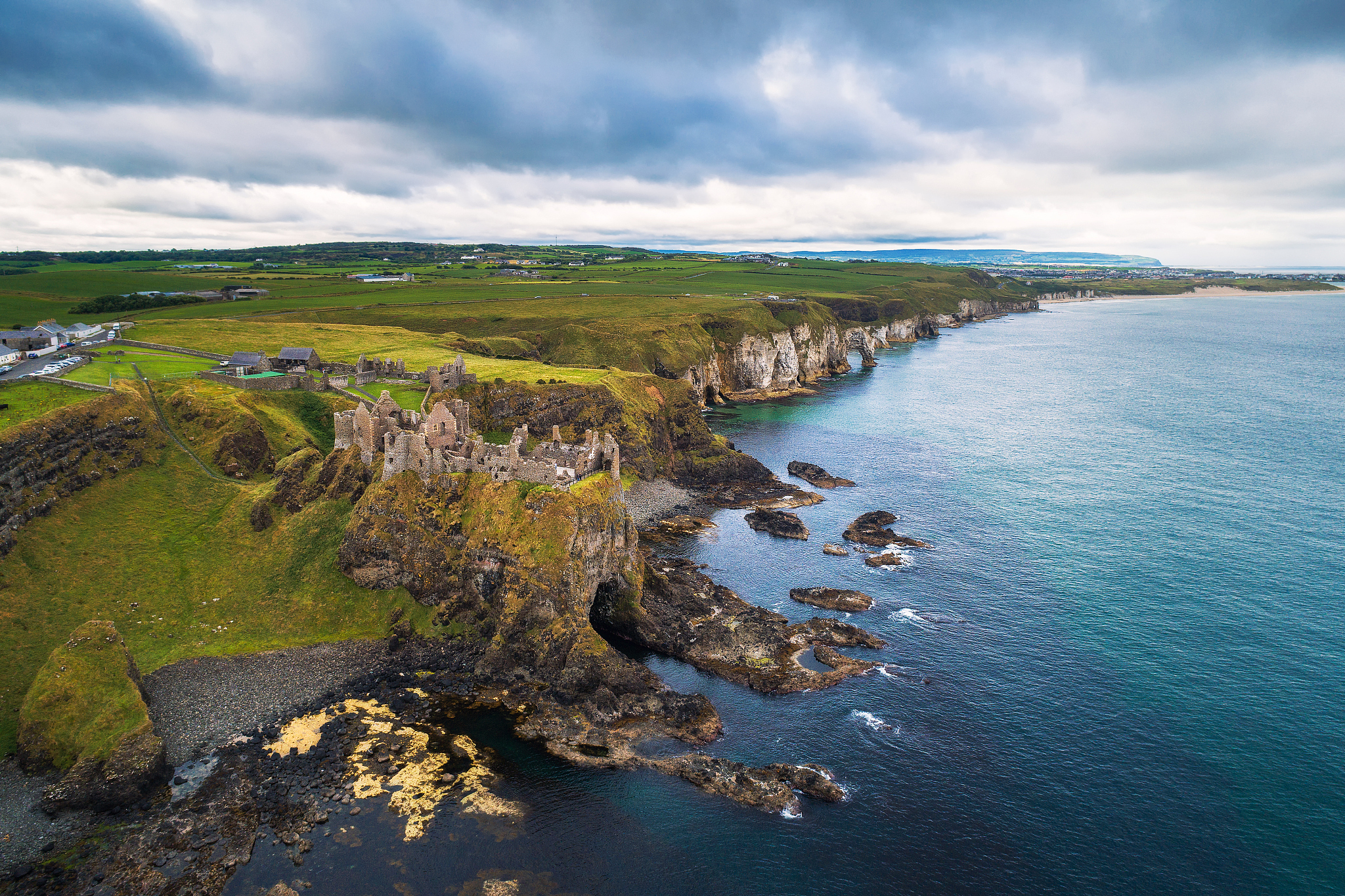 aerial view of the medieval dunluce castle ruins, ireland