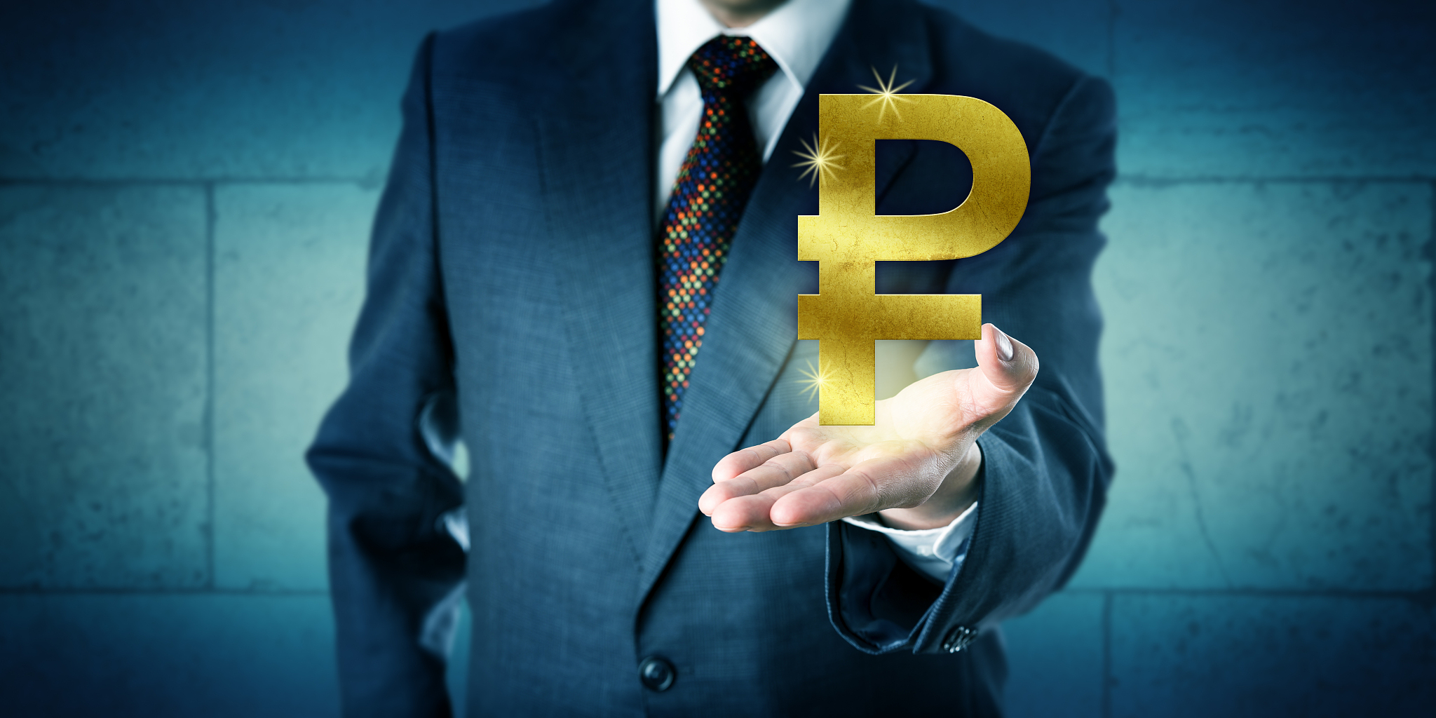 banker offering a golden russian ruble symbol