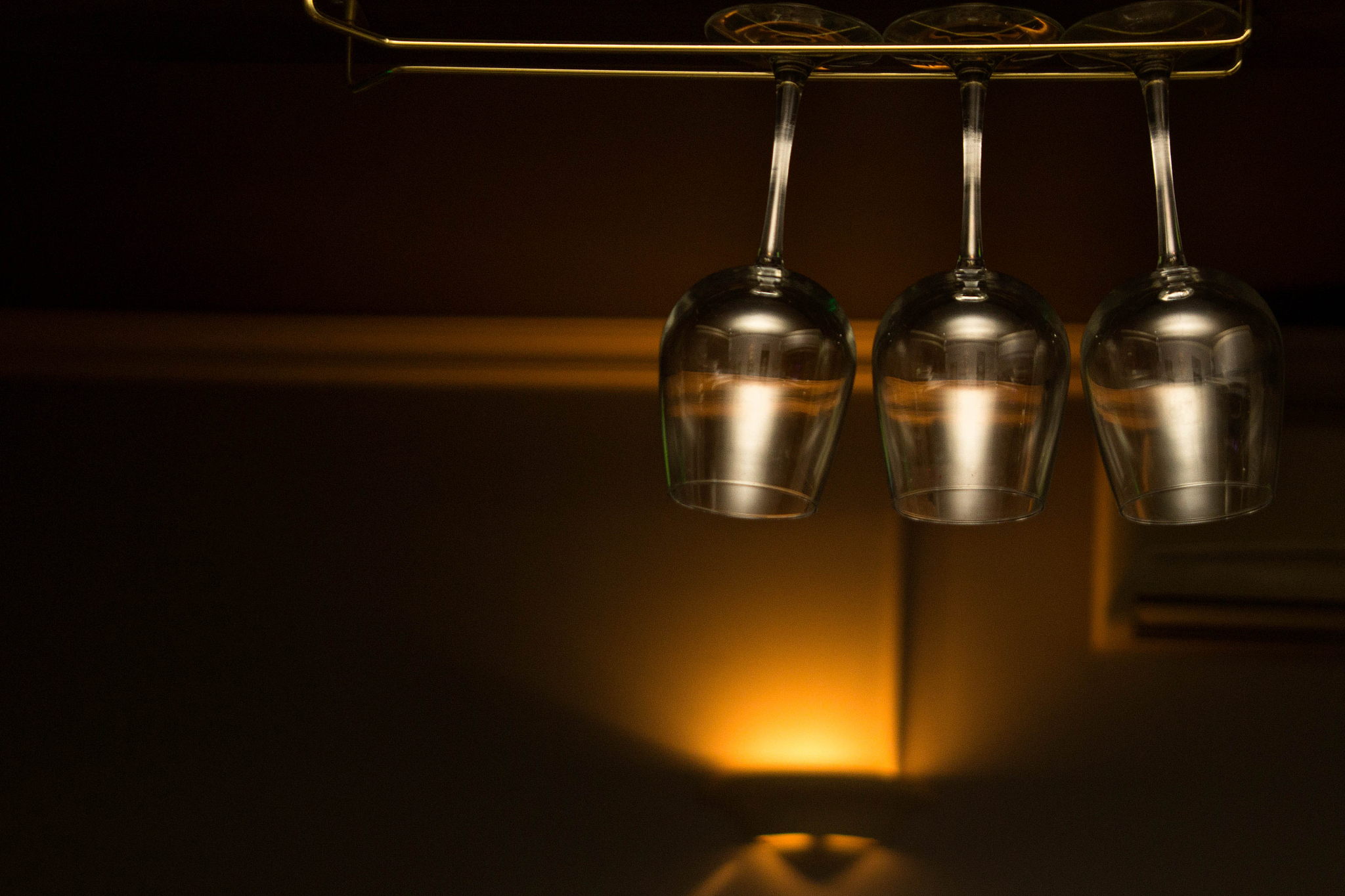 three glasses in bar