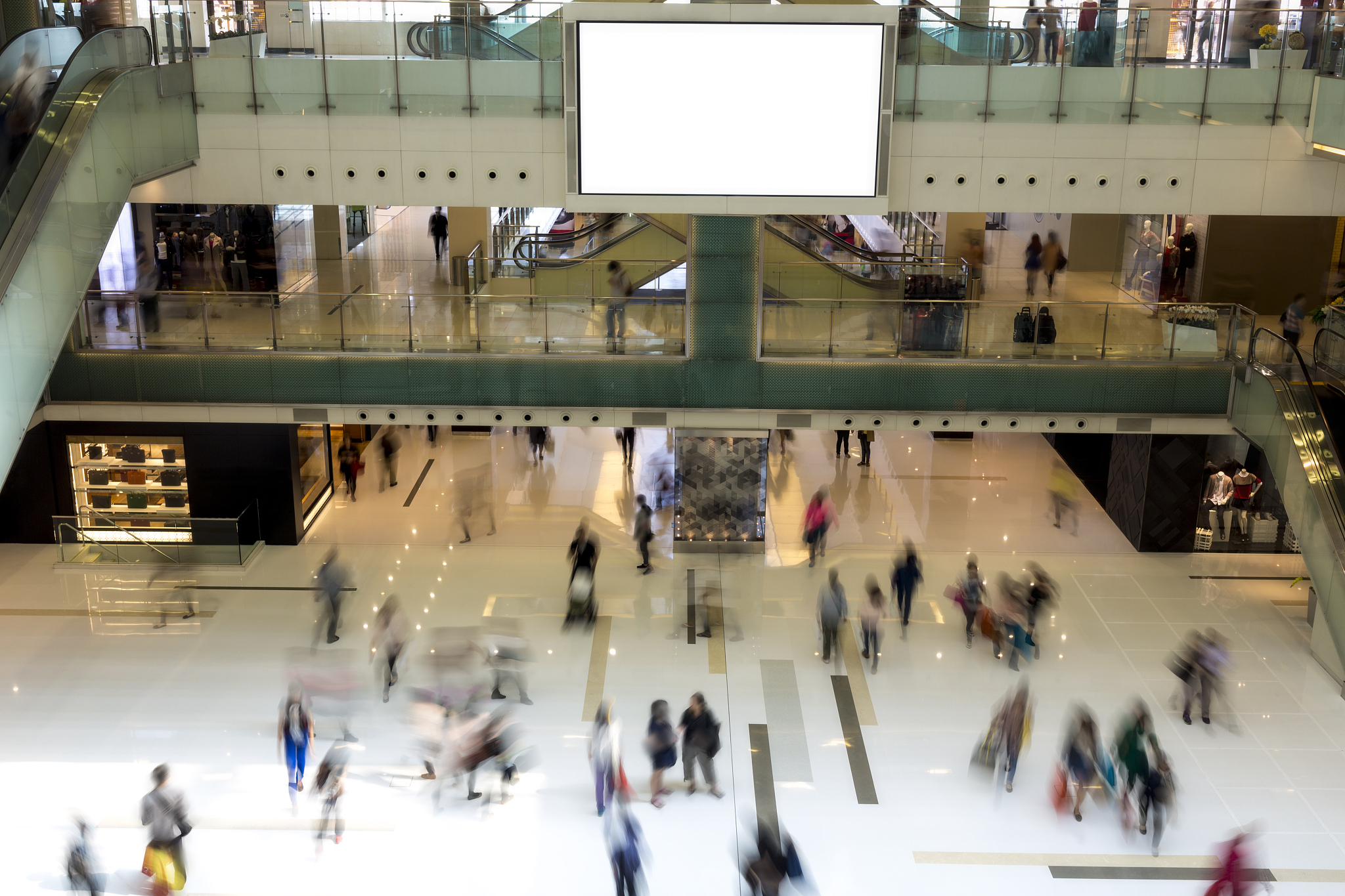 people walking in shopping