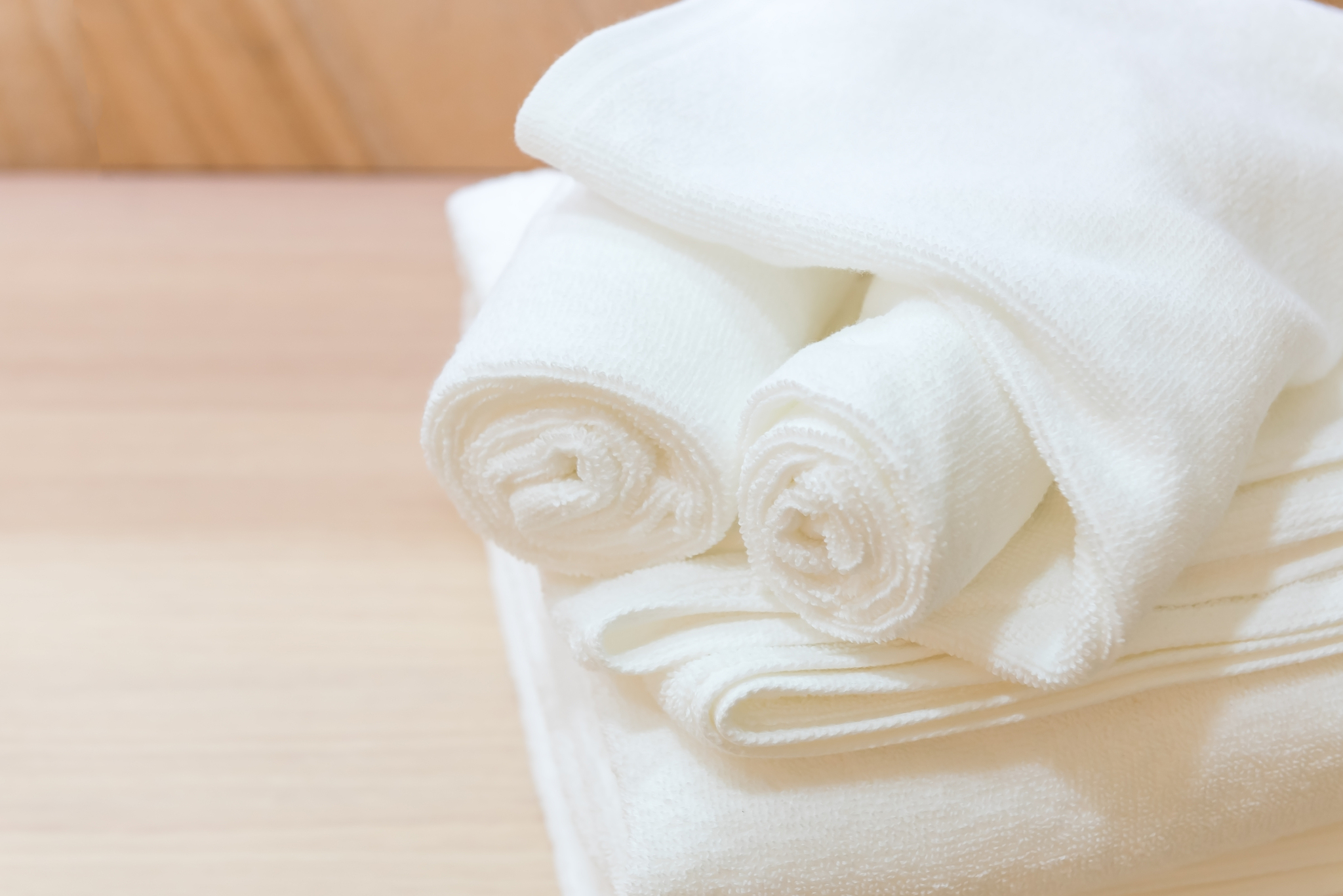 folded white towels