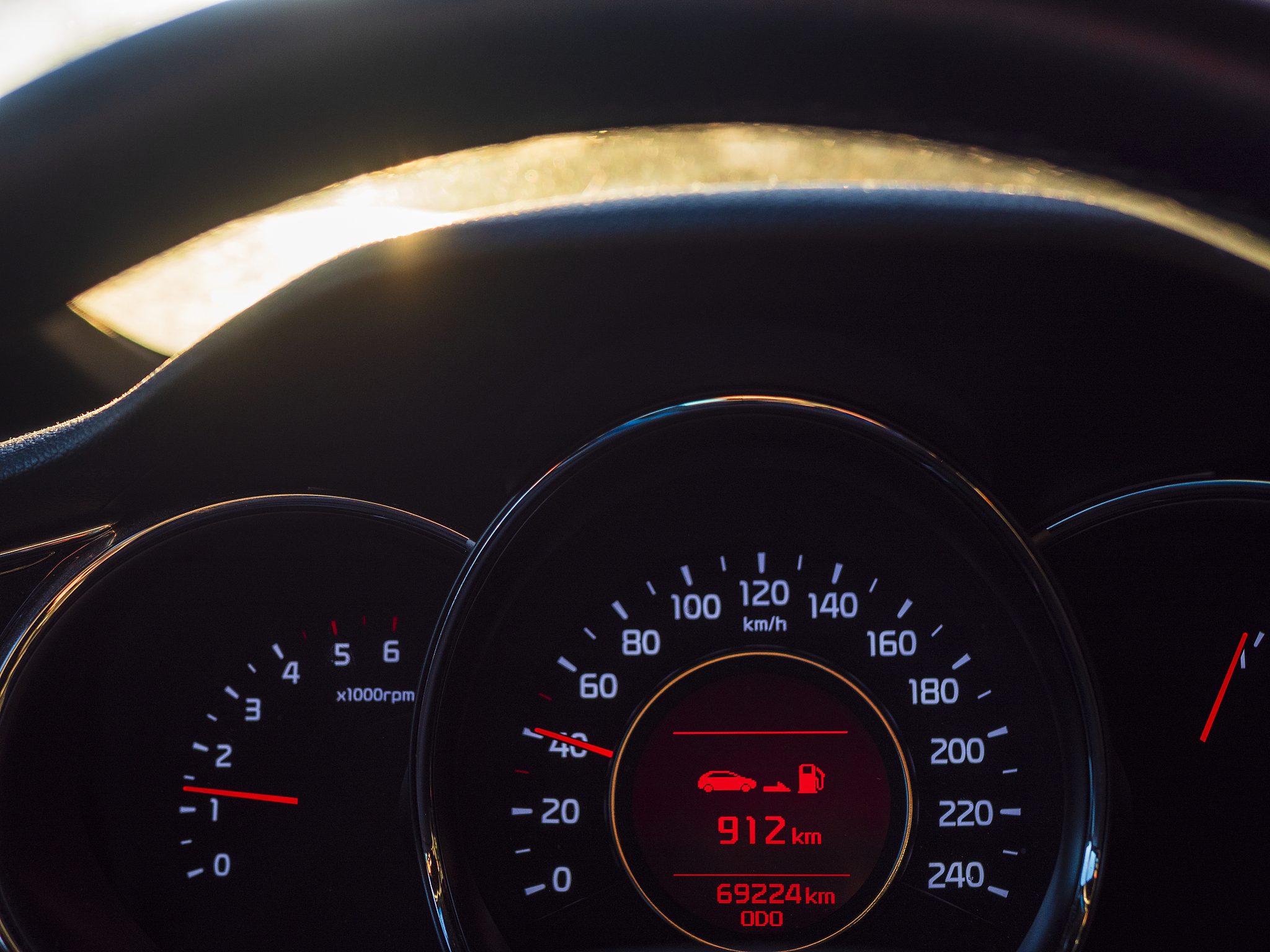 close-up of speedometer in car