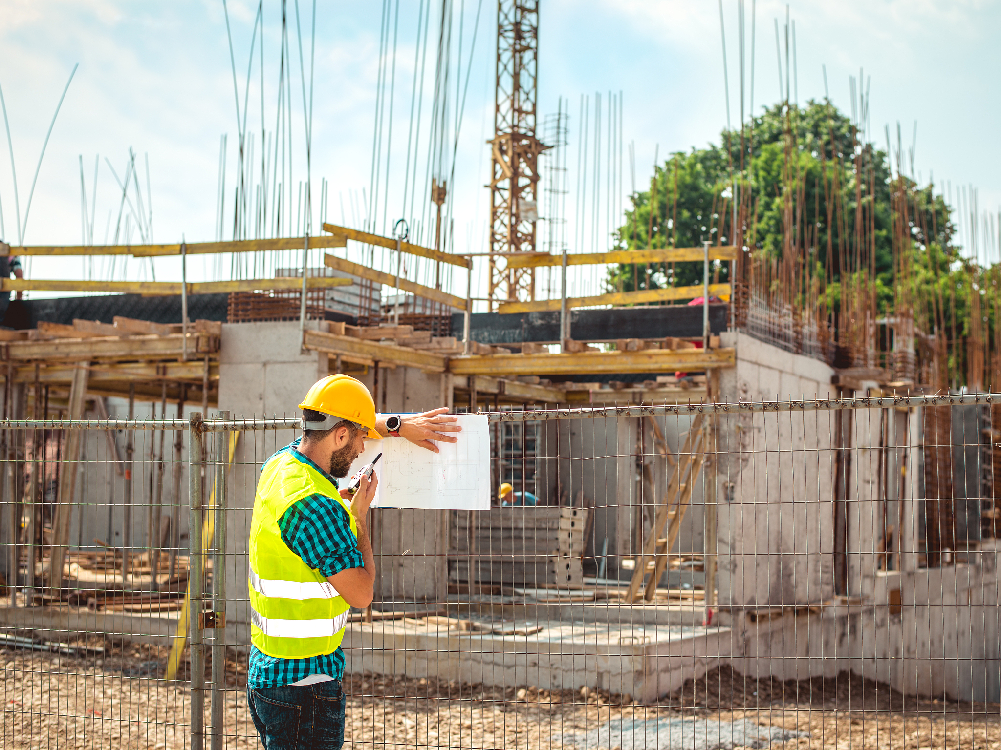 engineer talking on walkie-talkie