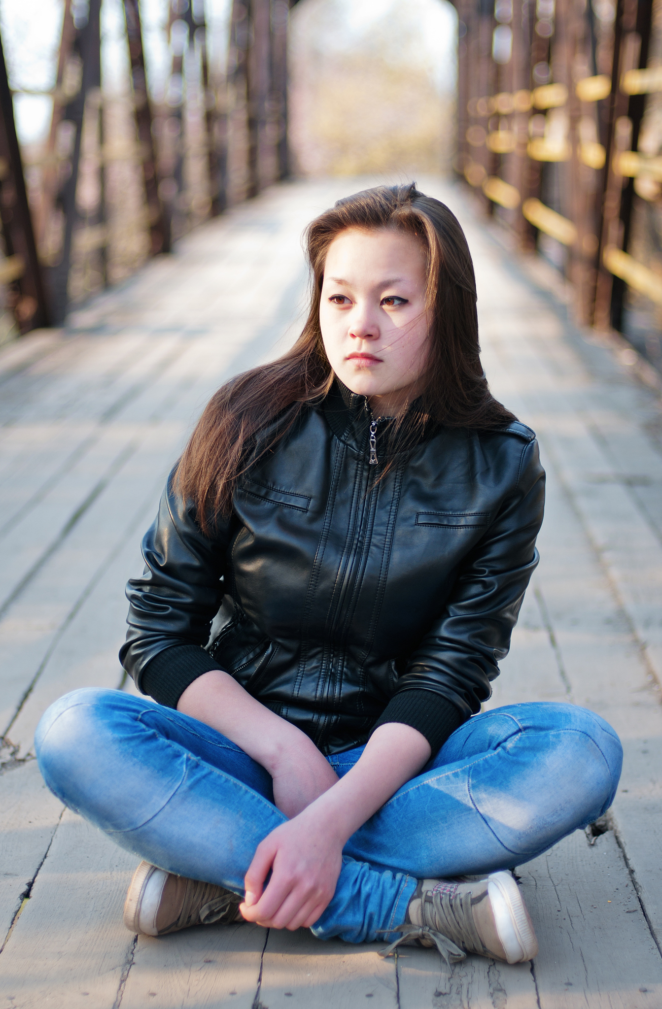 young asian girl on railway station