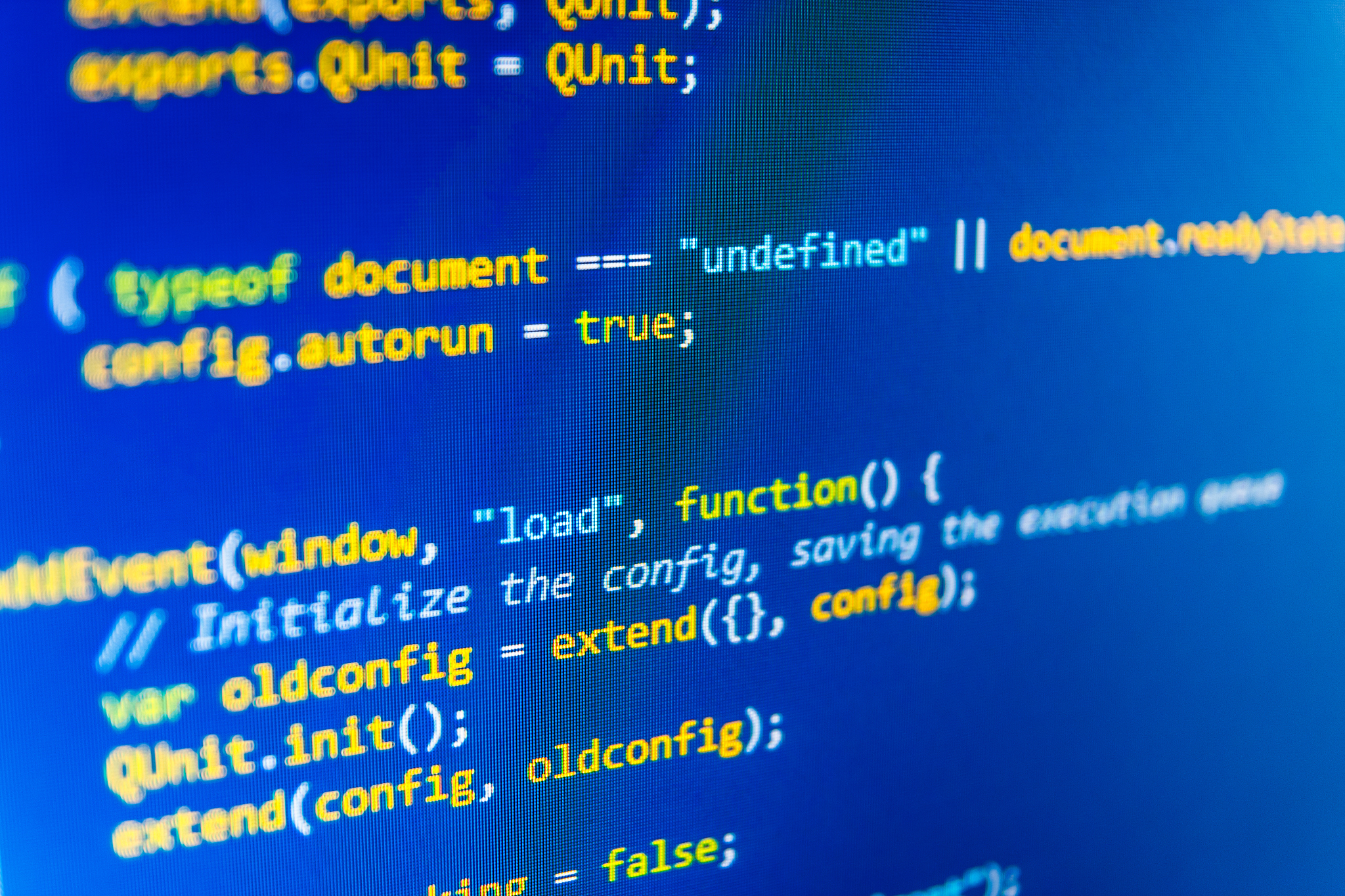 software developer programming code on computer