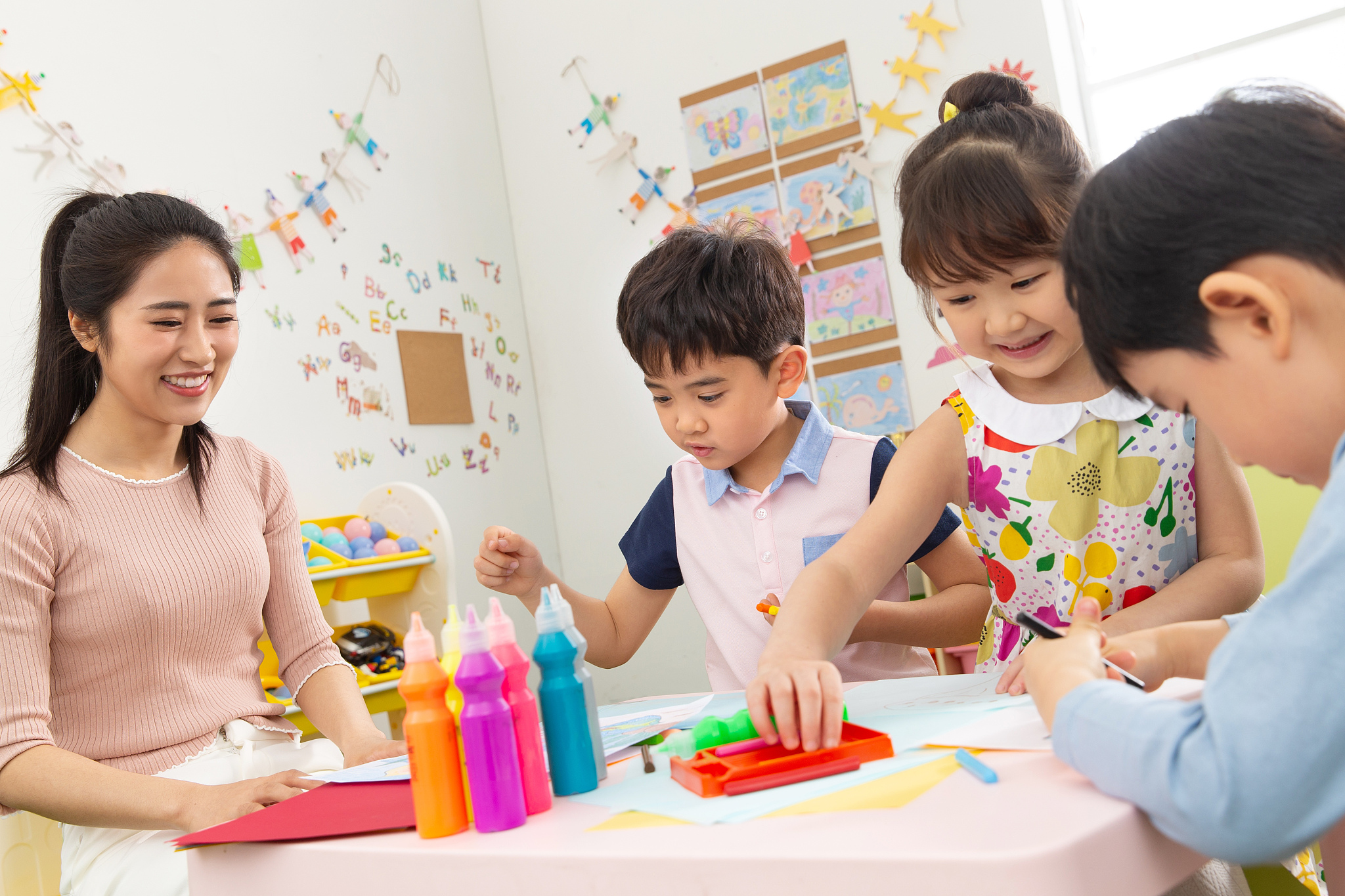 kindergarten teachers and the children