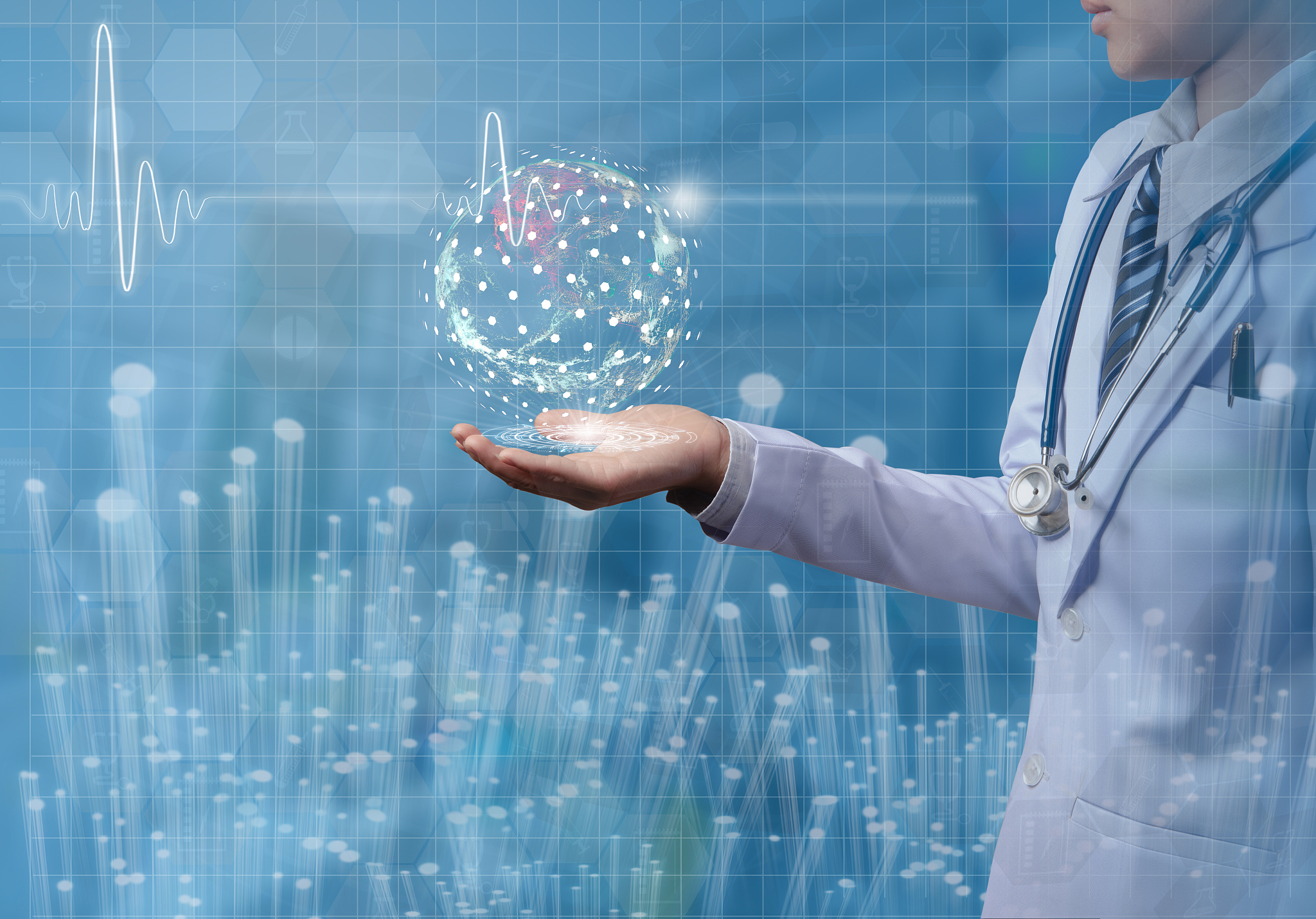 digital composite image of doctor holding interface