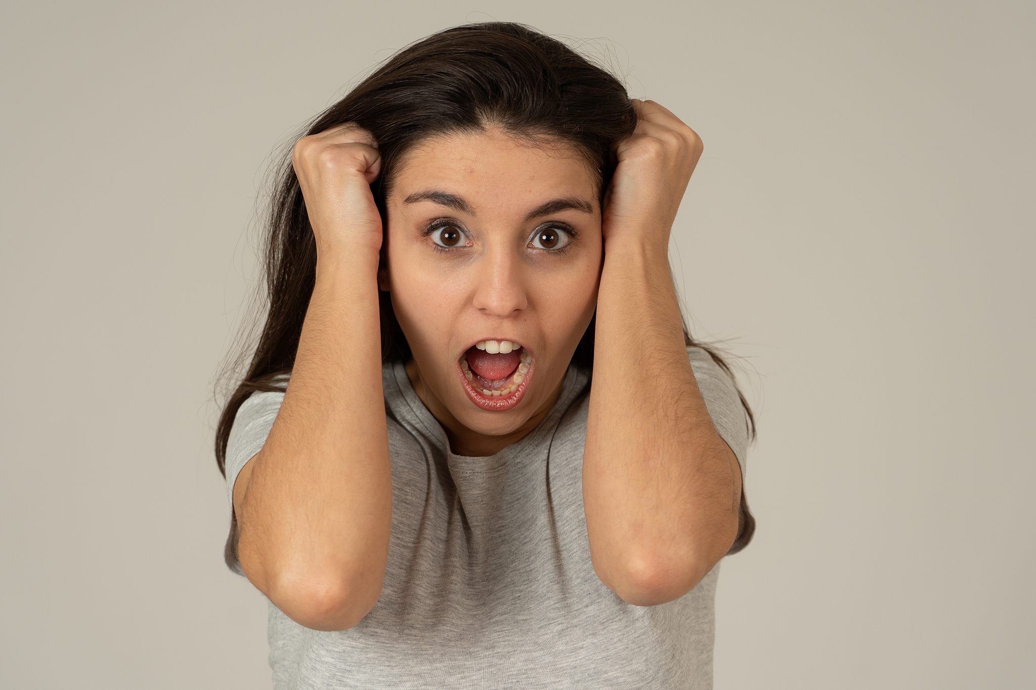 portrait of young attractive frustrated latin woman with angry a