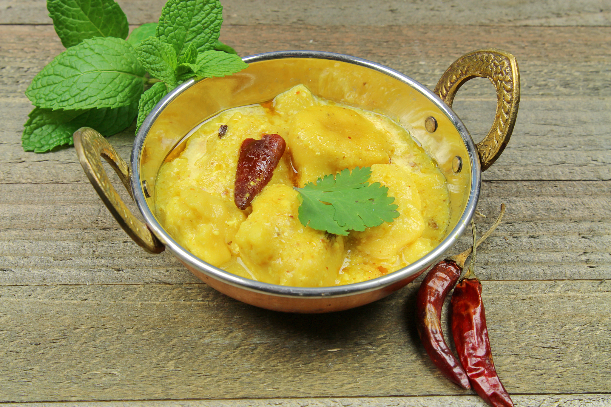 kadhi, dumplings with yogurt sauce curry