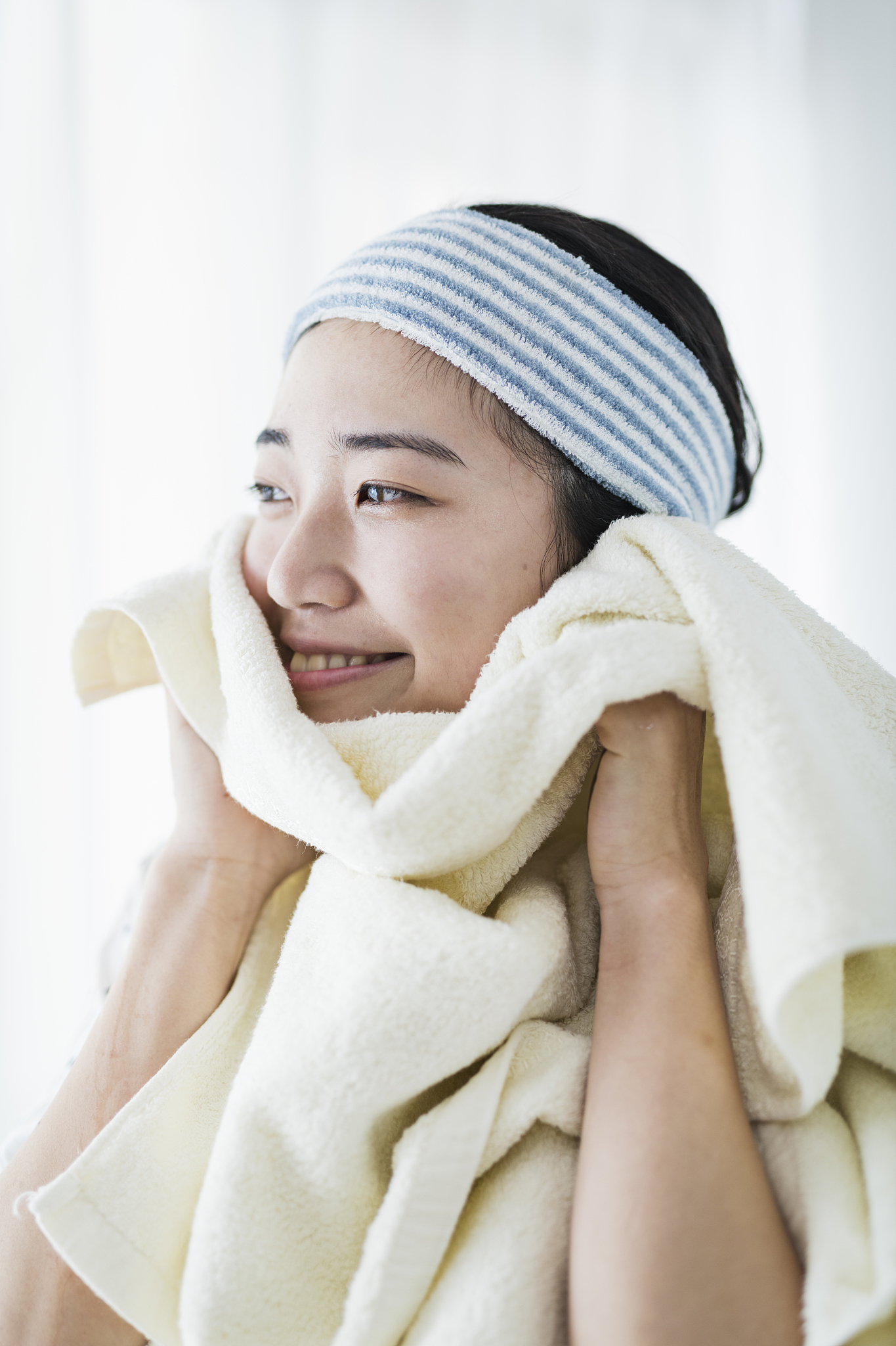 a woman washing her face