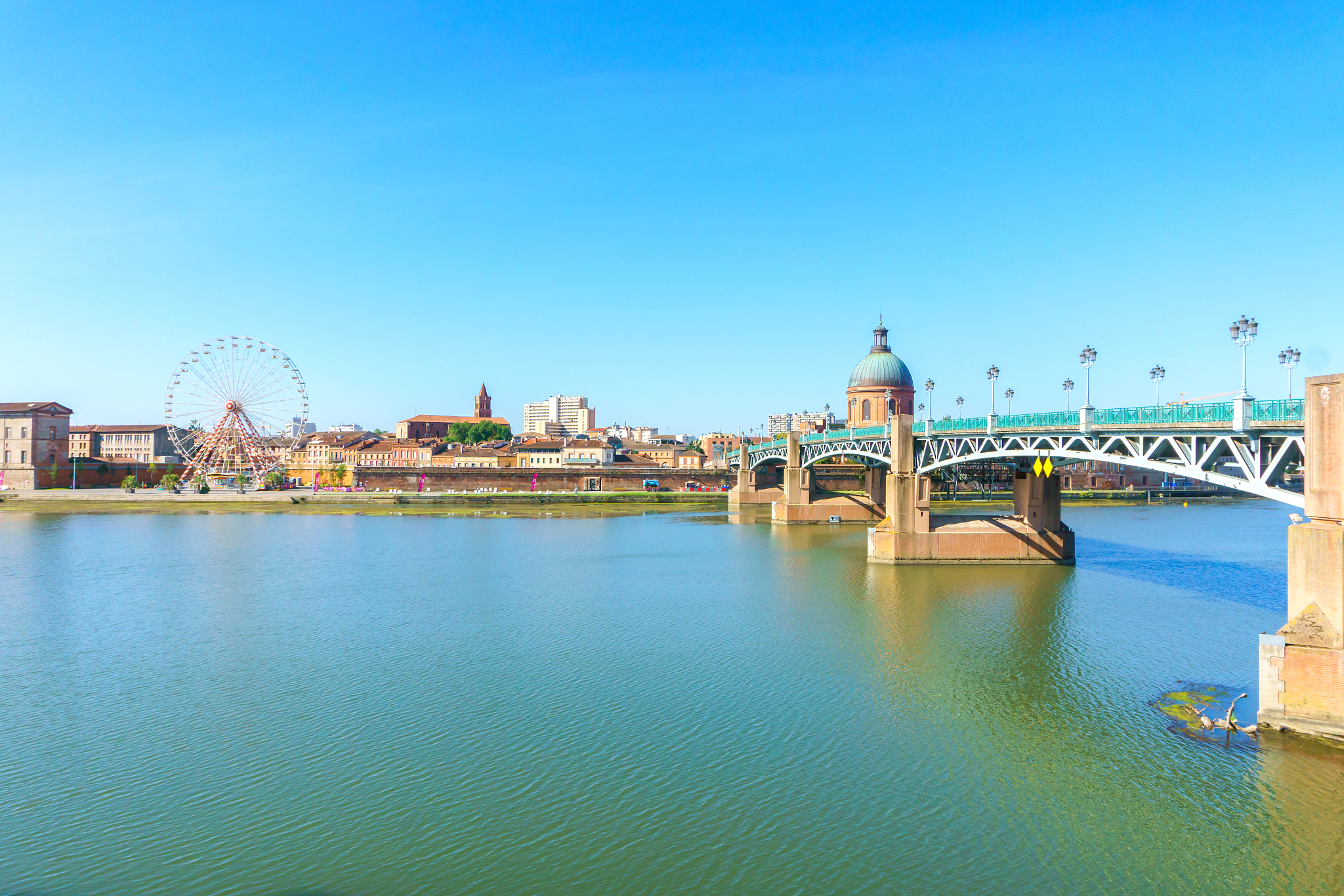 vew of saint-pierre bridge over garonne river and dome de la gra
