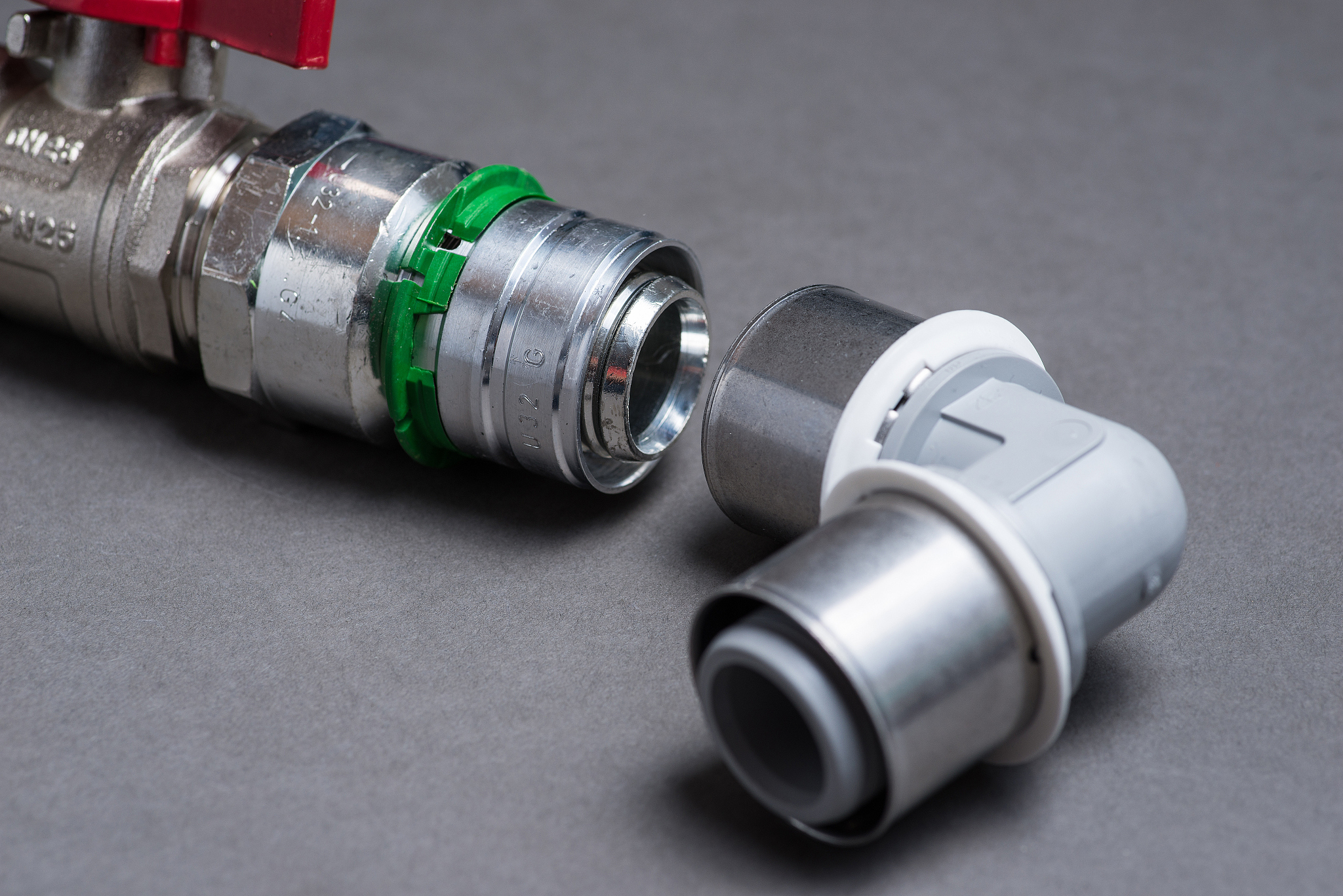 water valves with fittings on grey