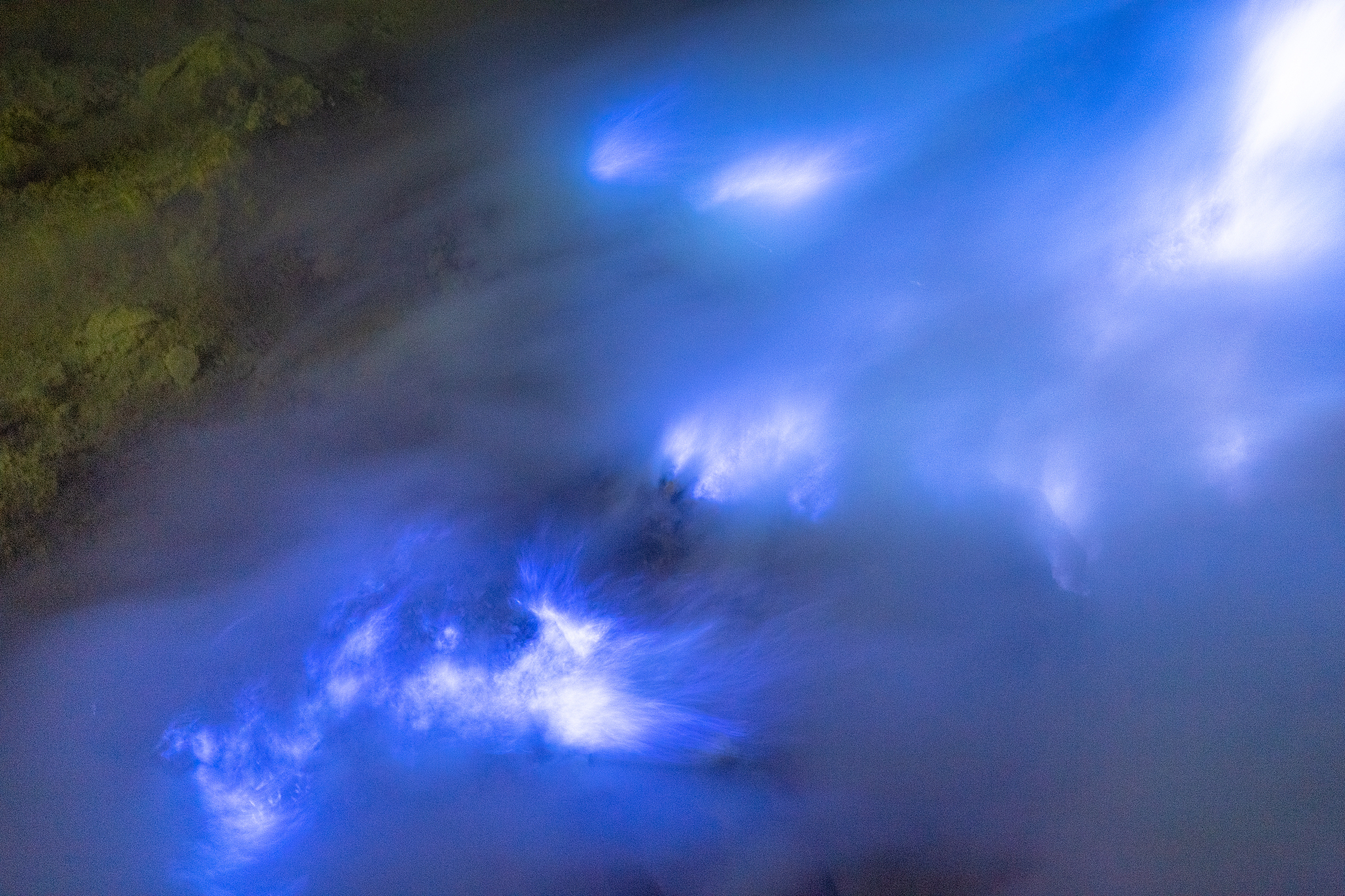 sulfur lake and smoking mine mountain  in the morning at kawah i