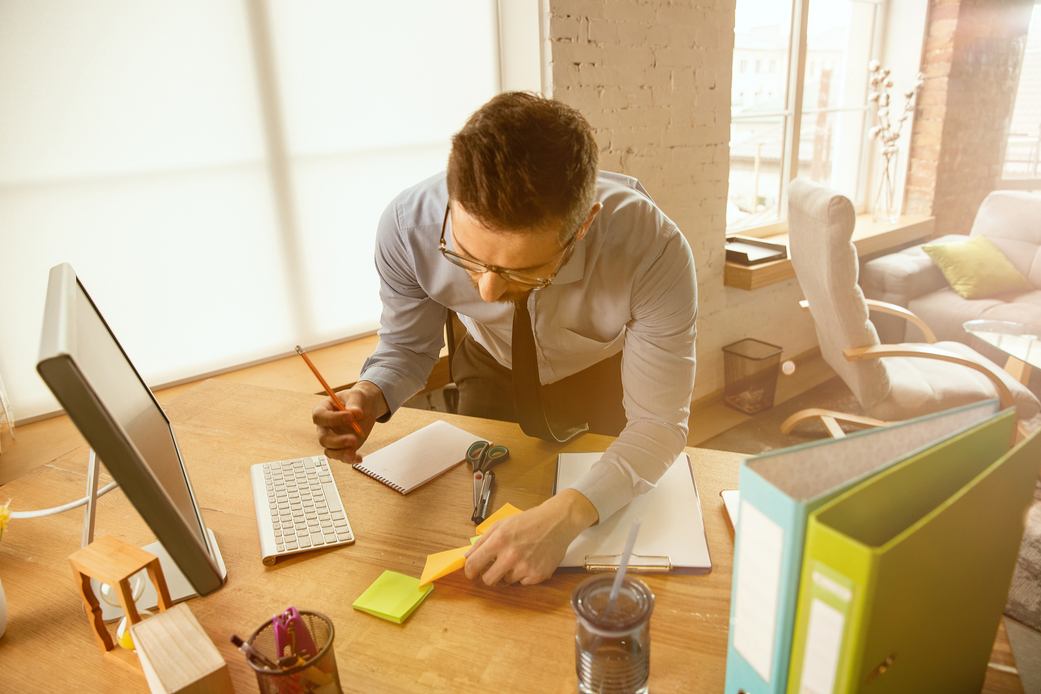 a young businessman moving in office, getting new work place