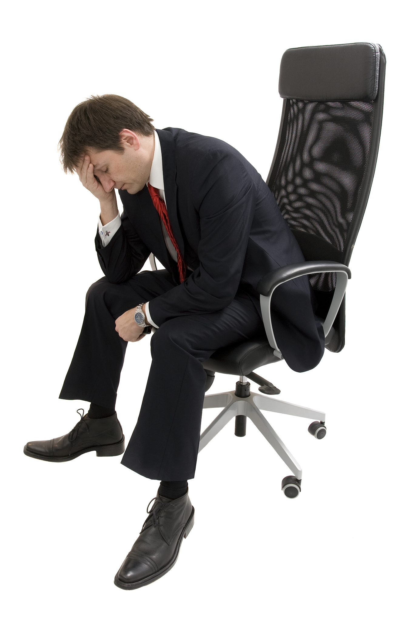 businessman sat in a chair