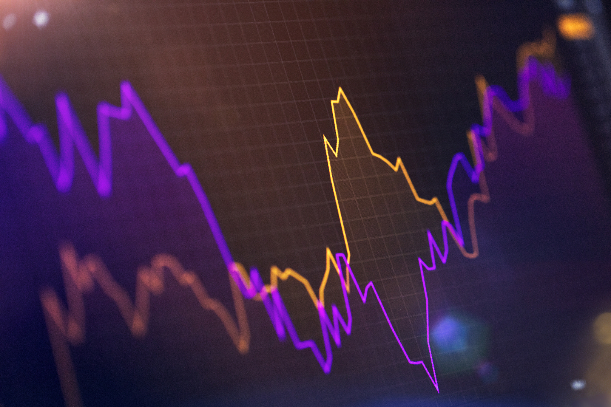 financial charts at digital display