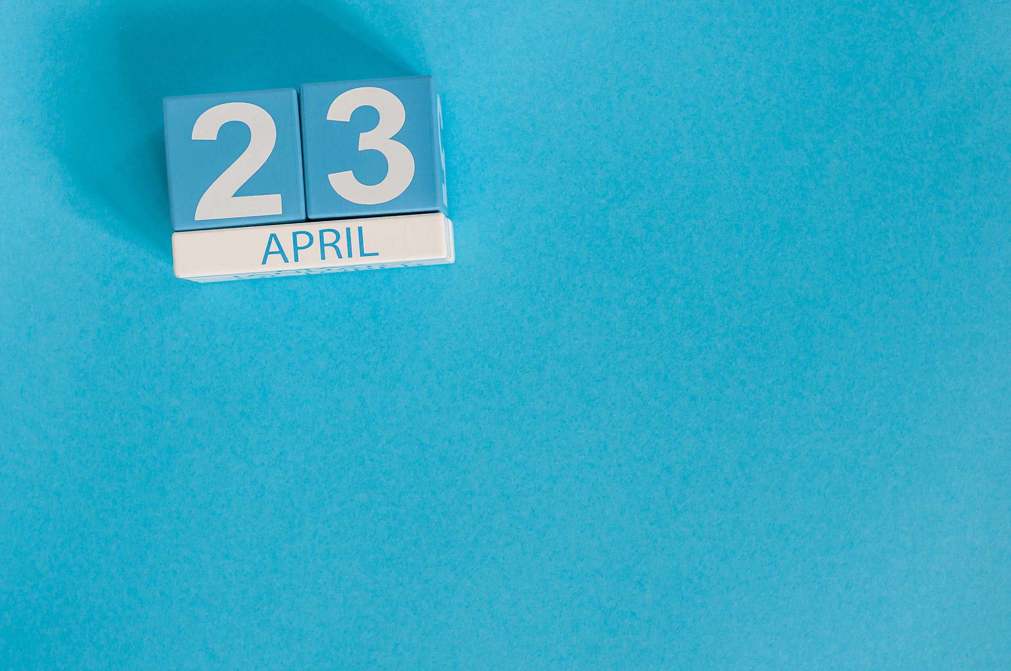 april 23rd. world book day. image of april 23 wooden