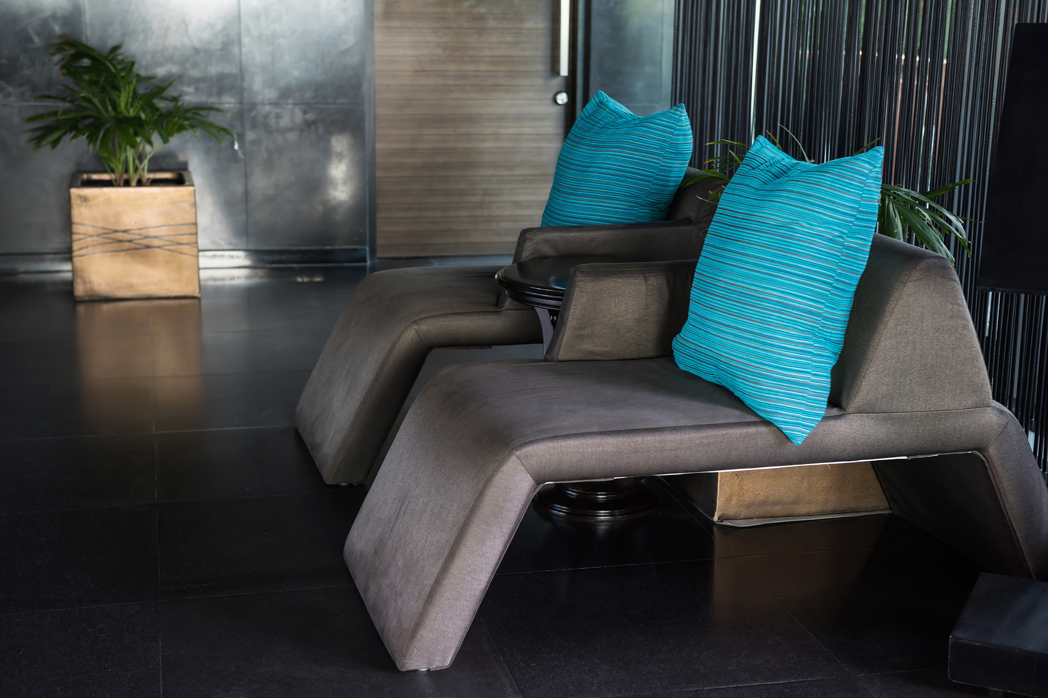 gray sofa bed chair in luxury hotel