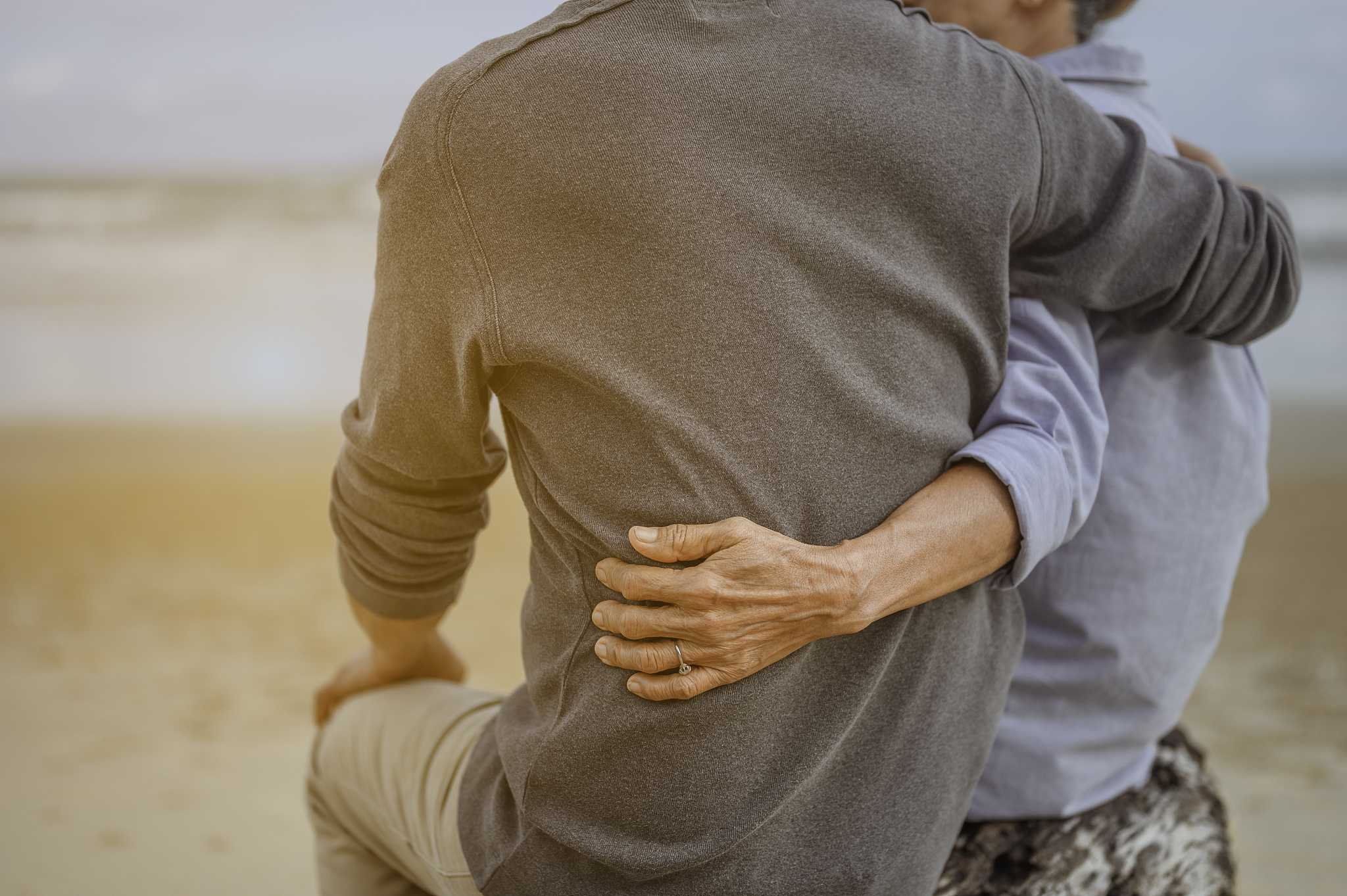 rear view of couple at beach