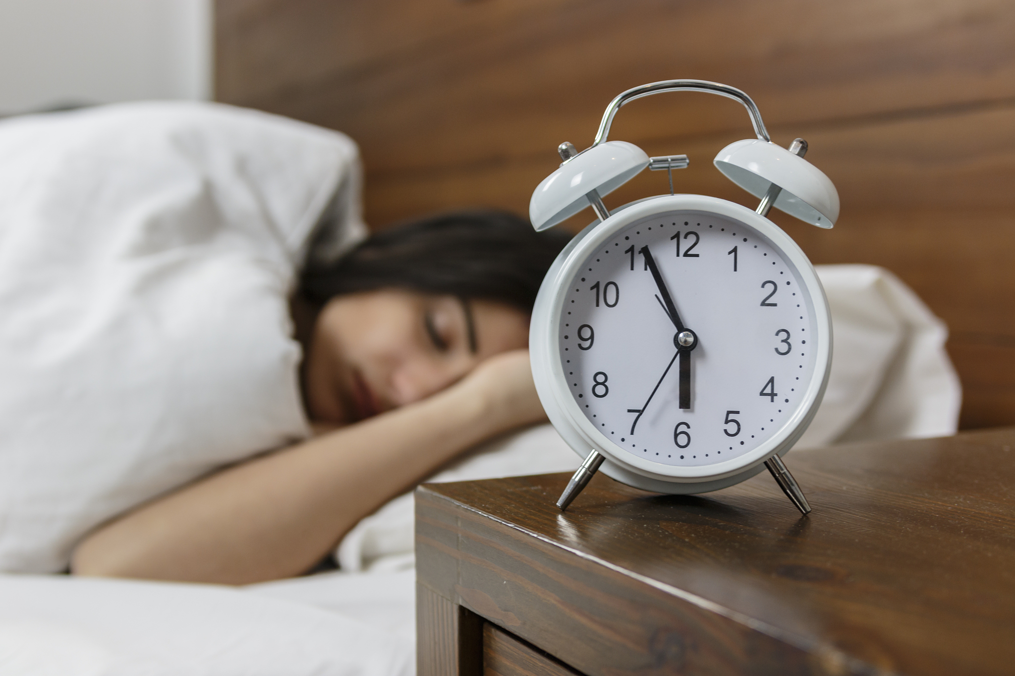 young beautiful woman sleeping in bed