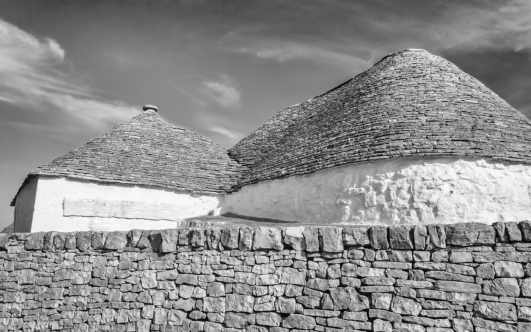 typical trulli buildings in alberobello, apulia, italy