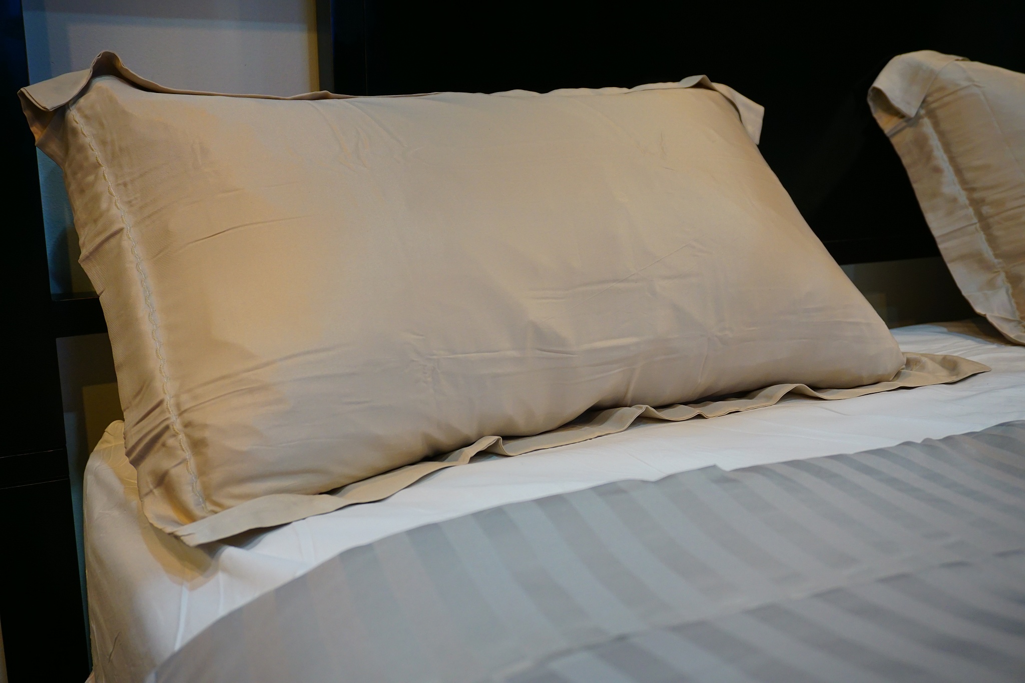 big white pillows in bedroom