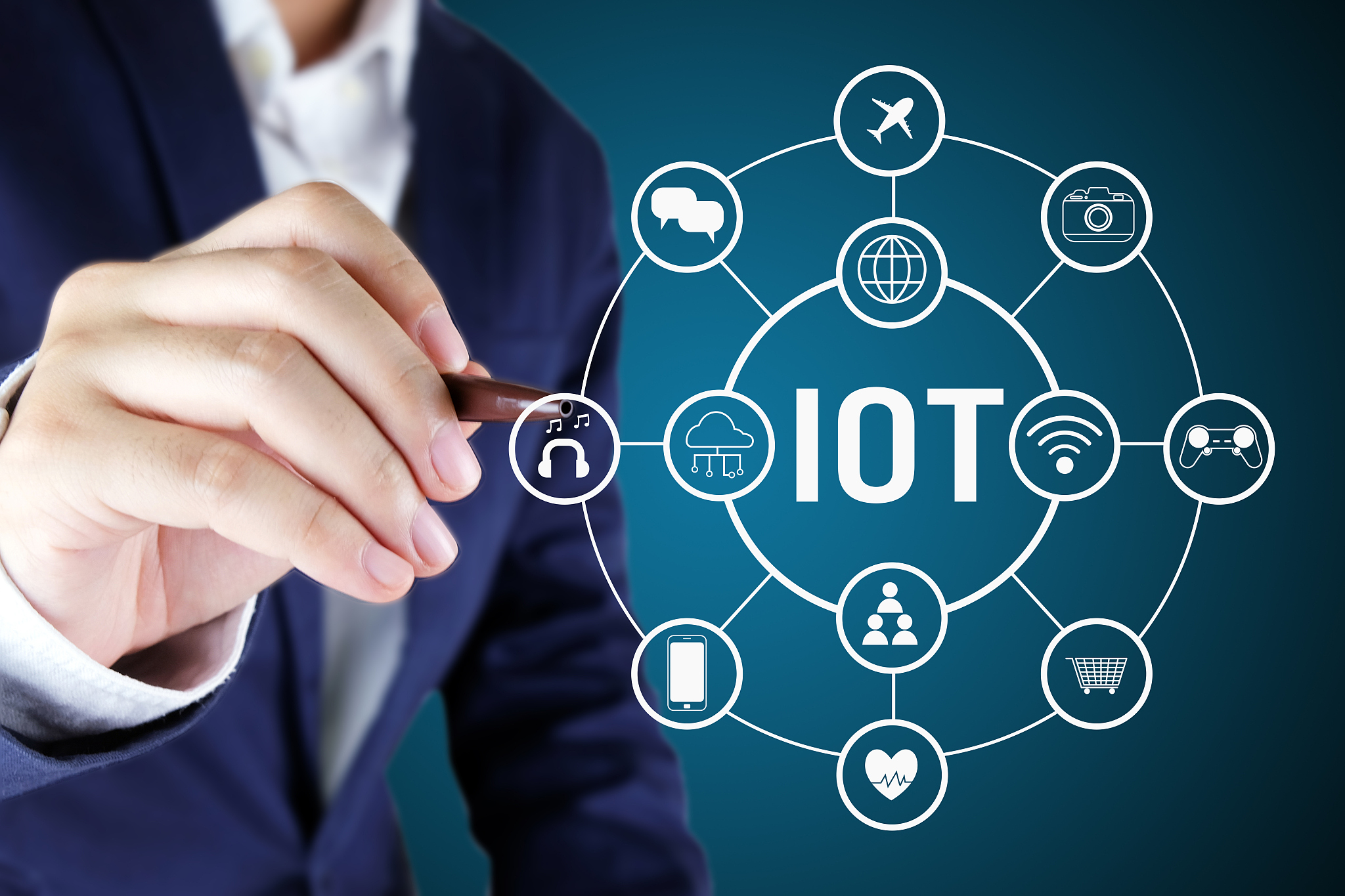 businessman pointing a global with line icon of iot.internet of 