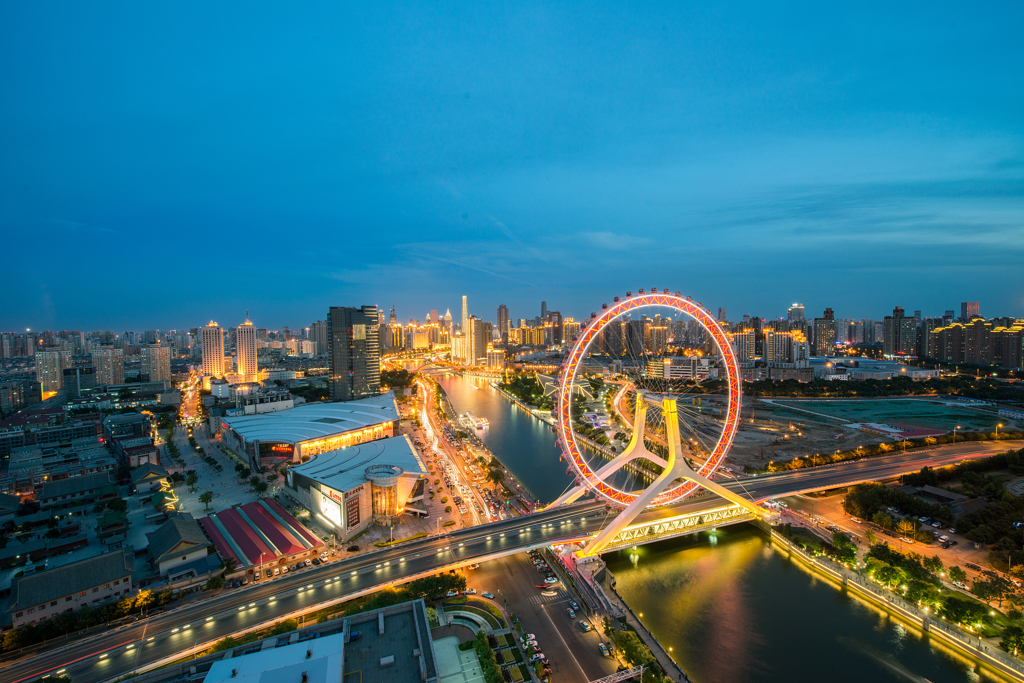 the cityscape of tianjin eye and tianjin urban skyline at night