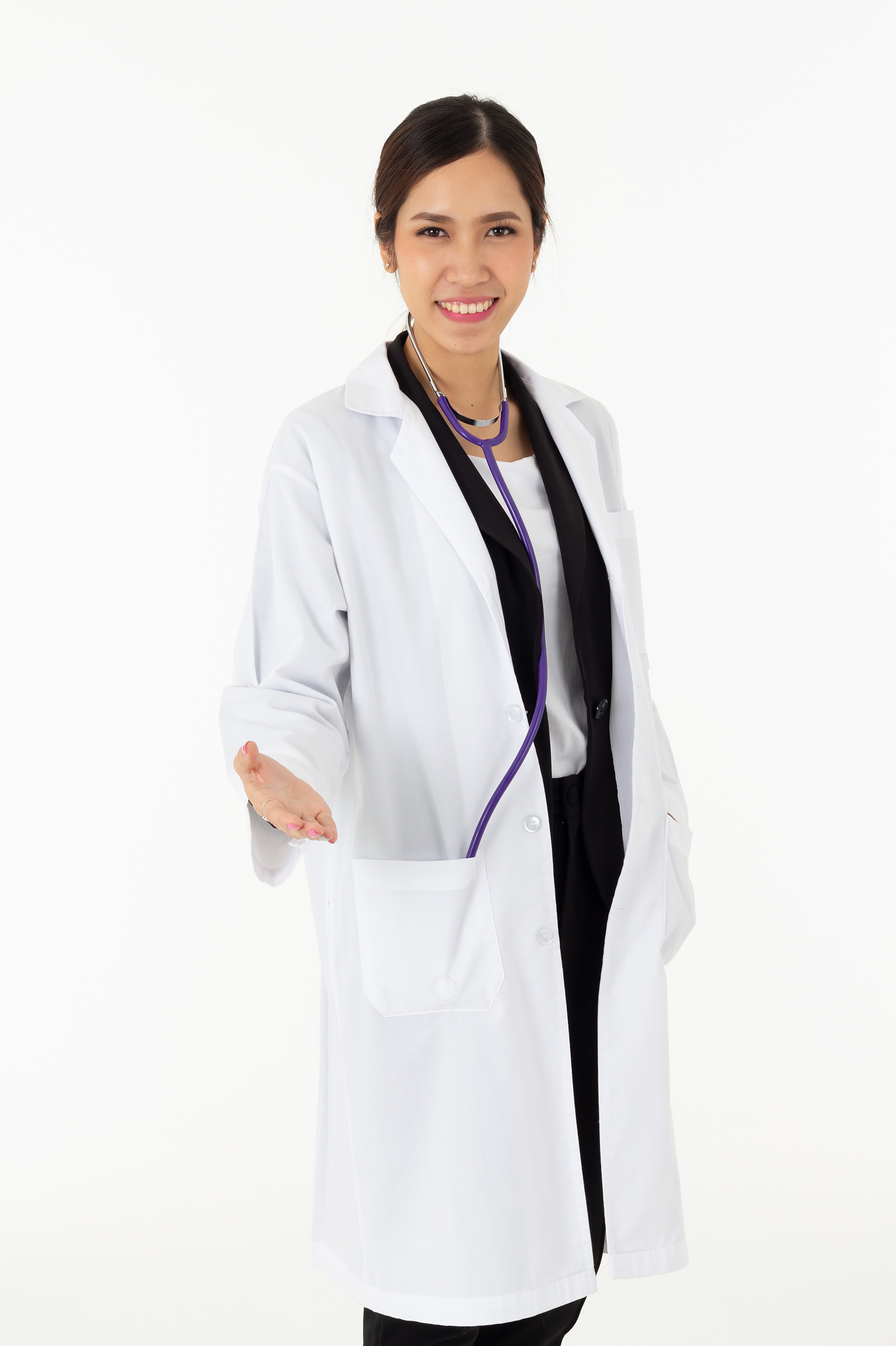 portrait of asian an attractive young female doctor in white coa